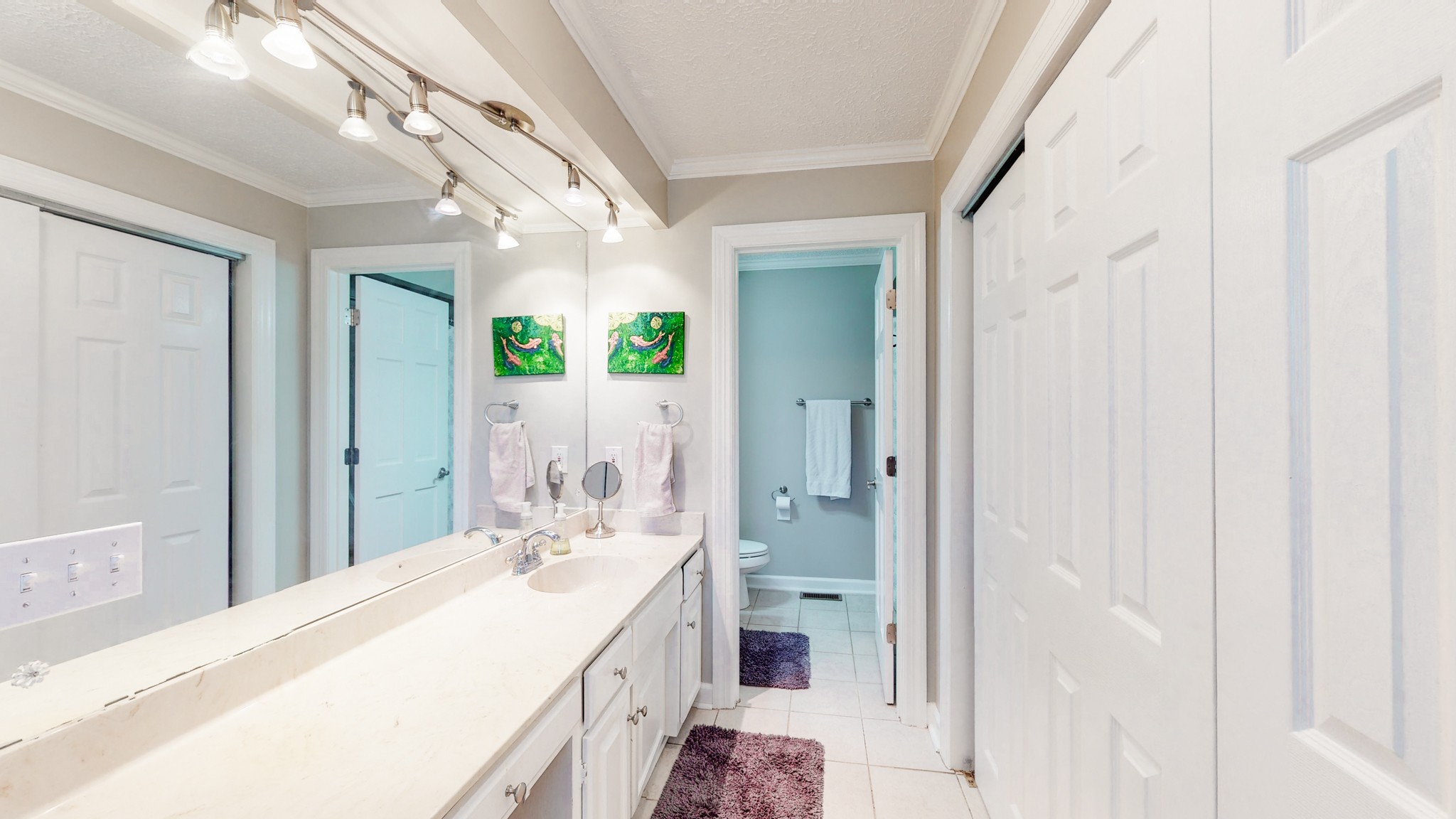207 Bethlehem Road Lebanon, TN 37087 - Photo 19 of 35 a spacious bathroom with a double vanity sink and a mirror