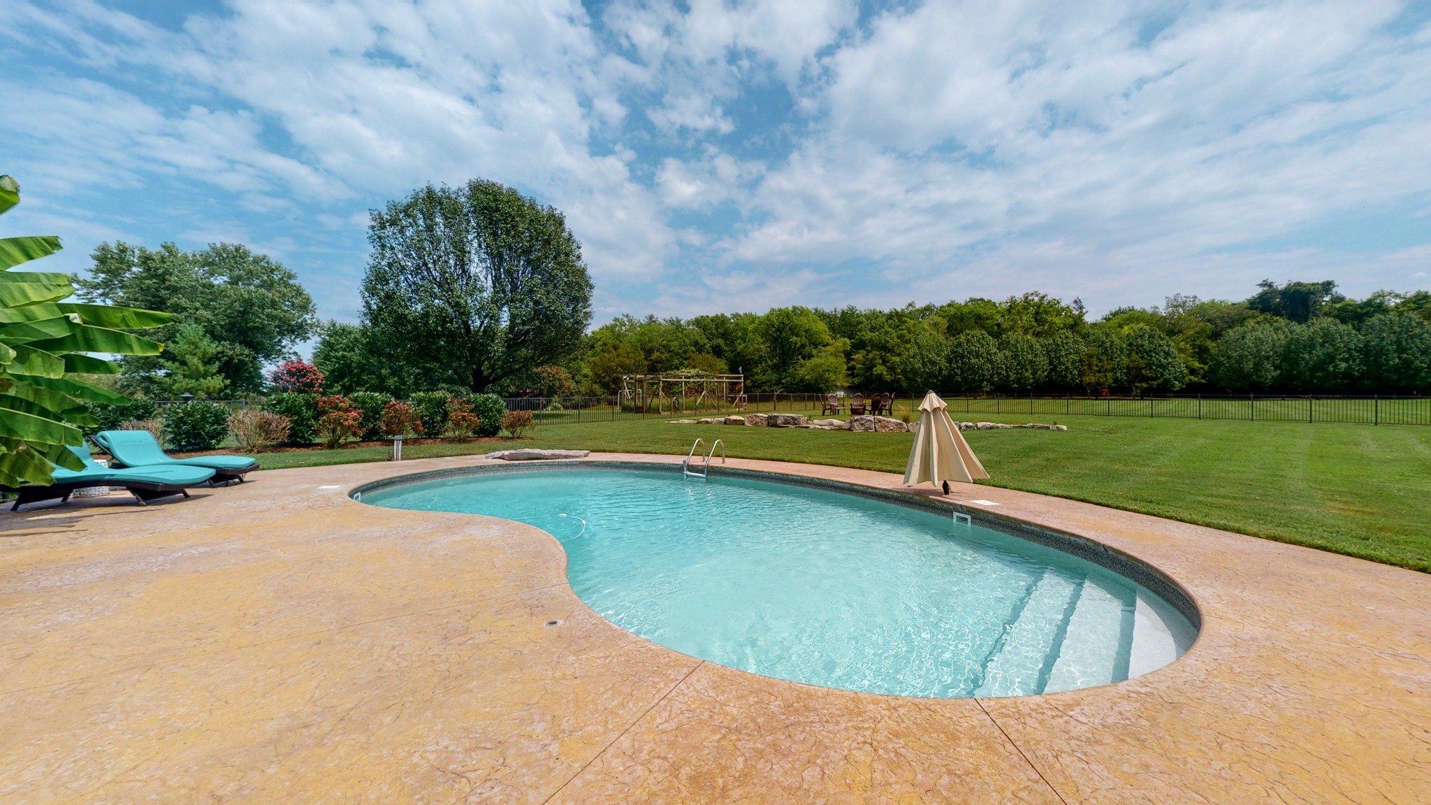 207 Bethlehem Road Lebanon, TN 37087 - Photo 28 of 35 a view of a swimming pool and trees in the background