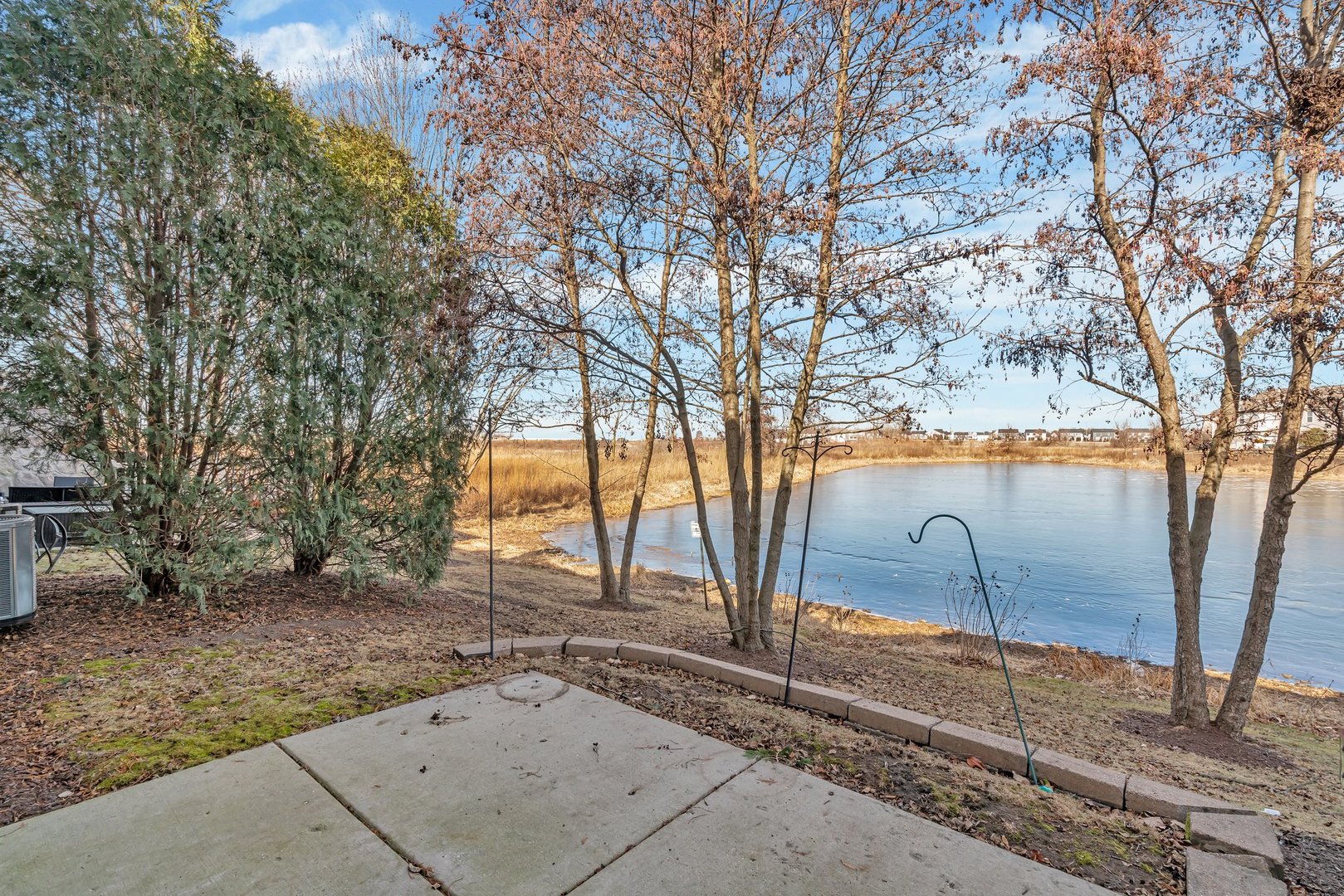 15340 Pinewood Road Lockport, IL 60441 - Photo 28 of 31 a backyard of a house with a trees