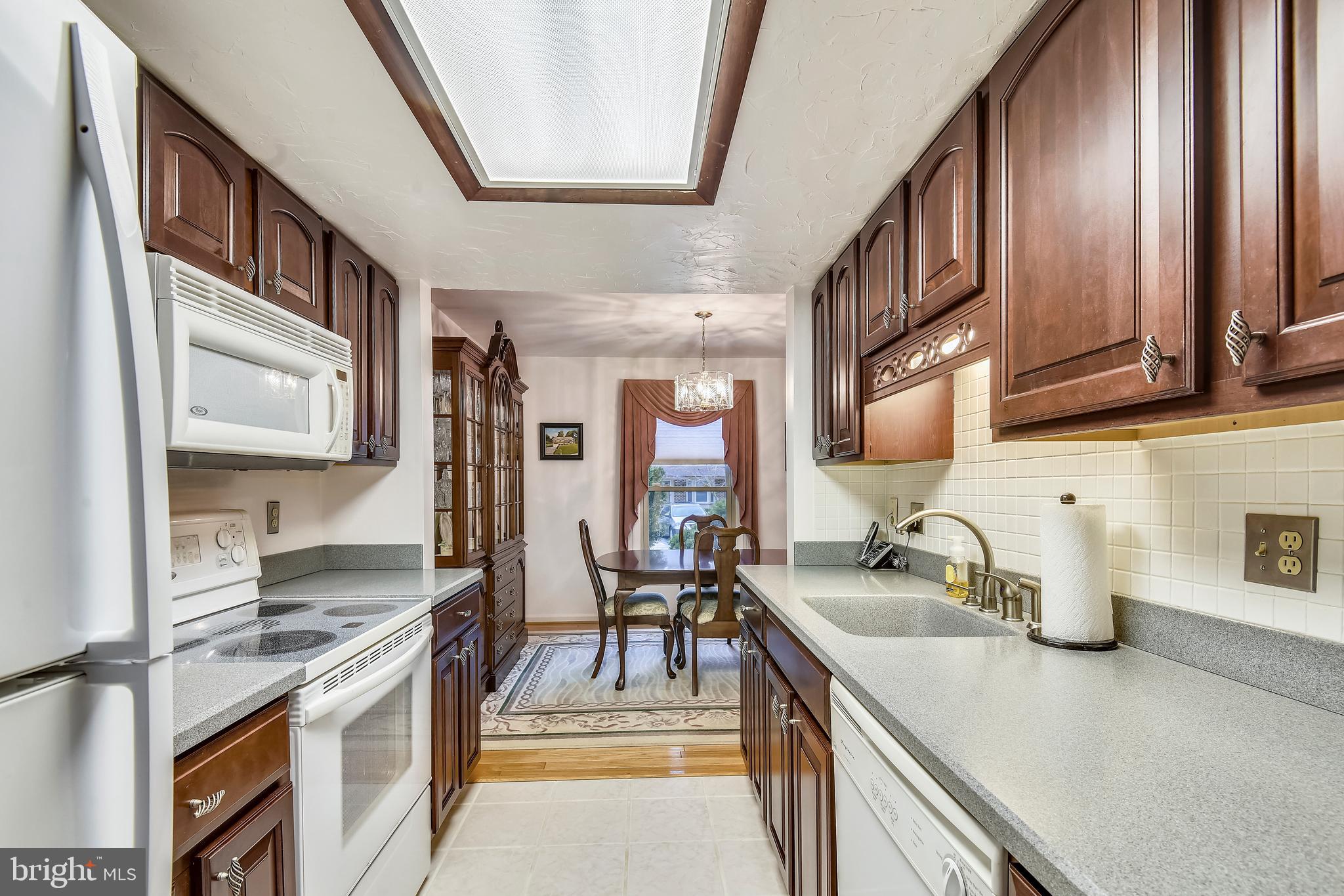 6282 Rathlin Drive Springfield, VA 22152 - Photo 11 of 37 Kitchen opening to Dining Room