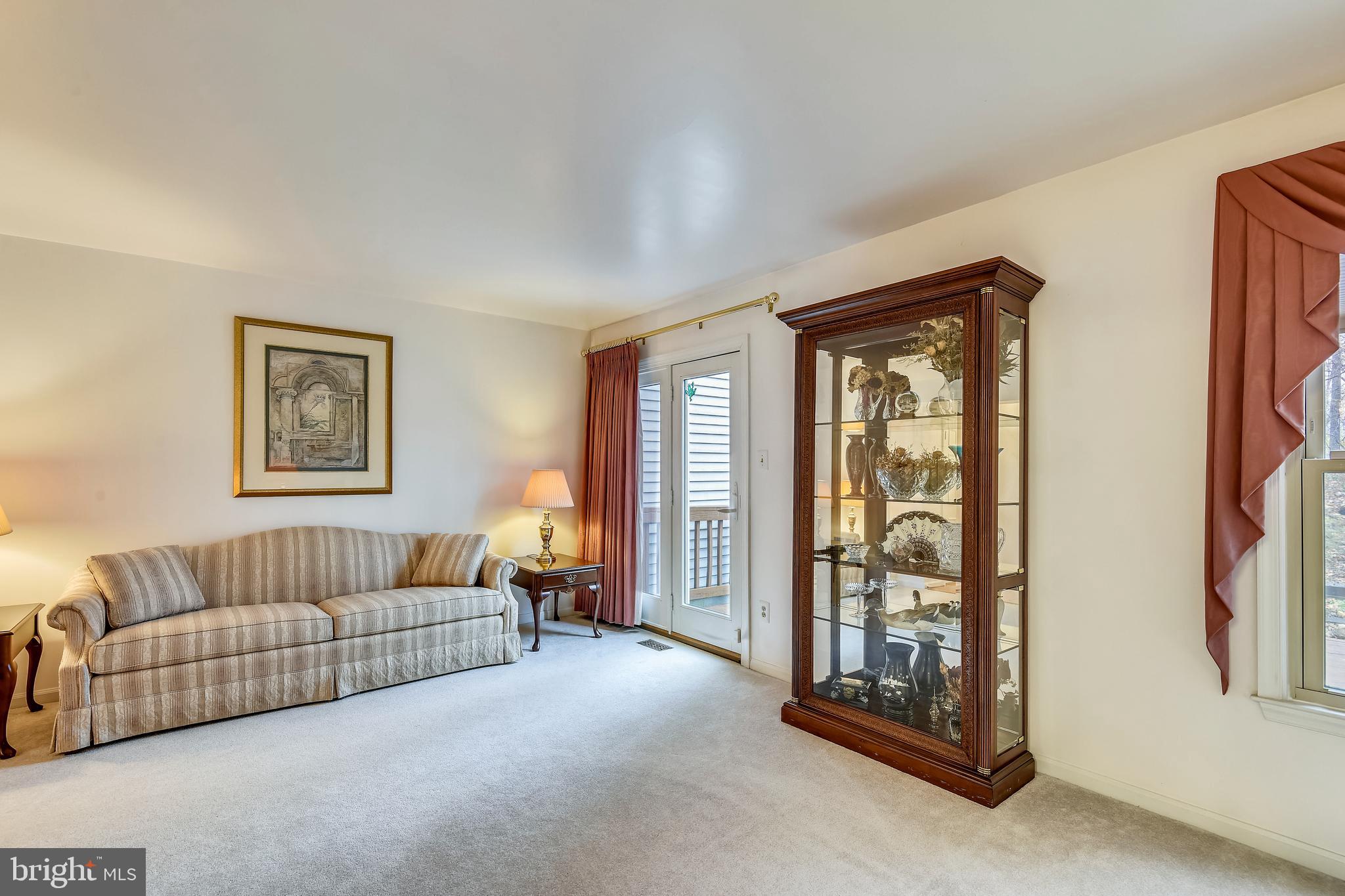 6282 Rathlin Drive Springfield, VA 22152 - Photo 6 of 37 Living Room with French Doors to Deck