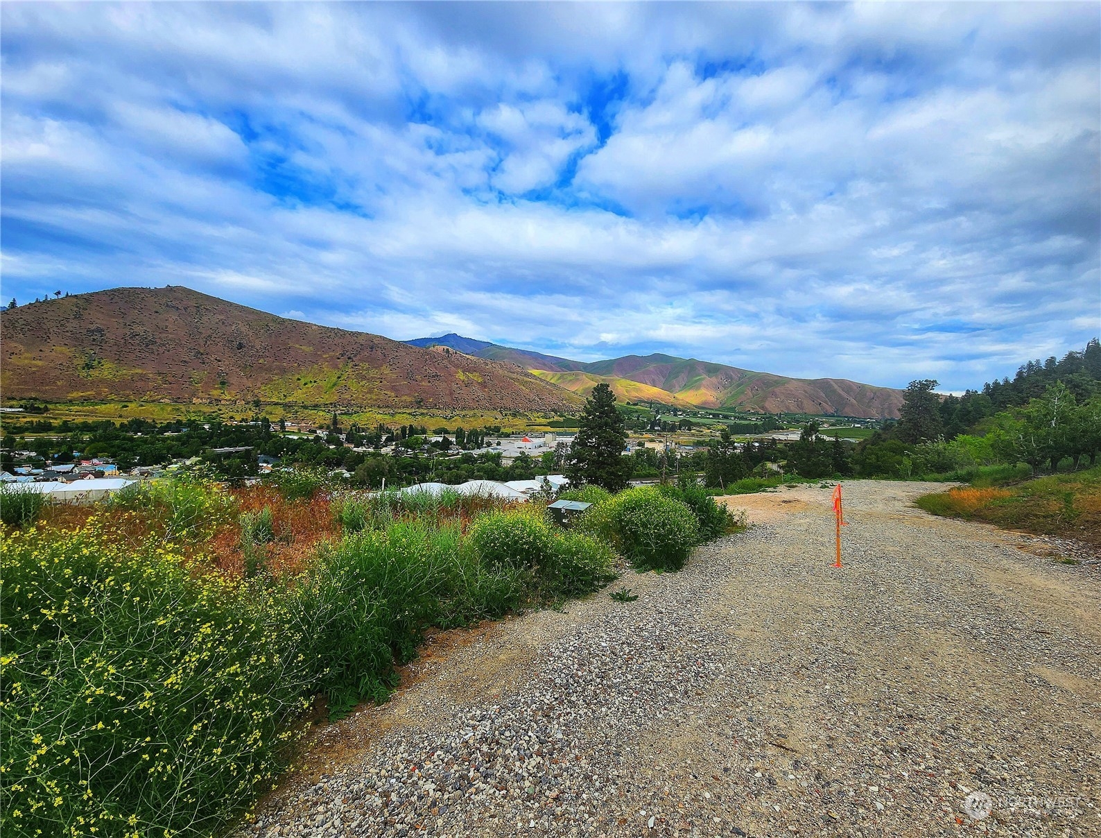 309 Kennedy Road Cashmere, WA 98815 - Photo 5 of 7 a view of a lake with a mountain in the background