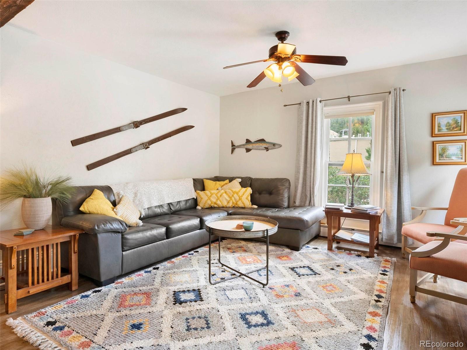 614 Rose Street Georgetown, CO 80444 - Photo 11 of 40 a living room with furniture and a window