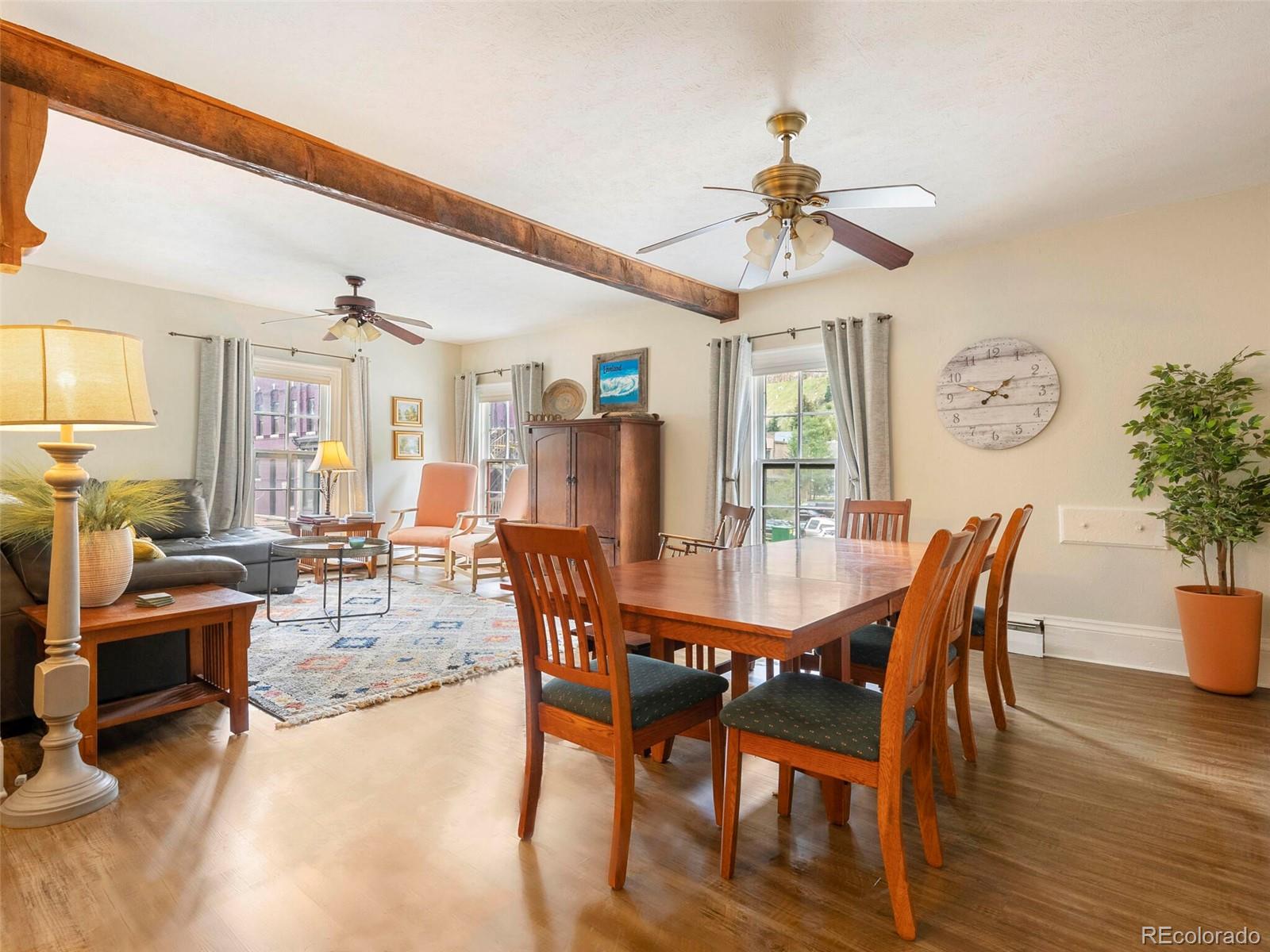614 Rose Street Georgetown, CO 80444 - Photo 13 of 40 a view of a a dining room with furniture window and wooden floor