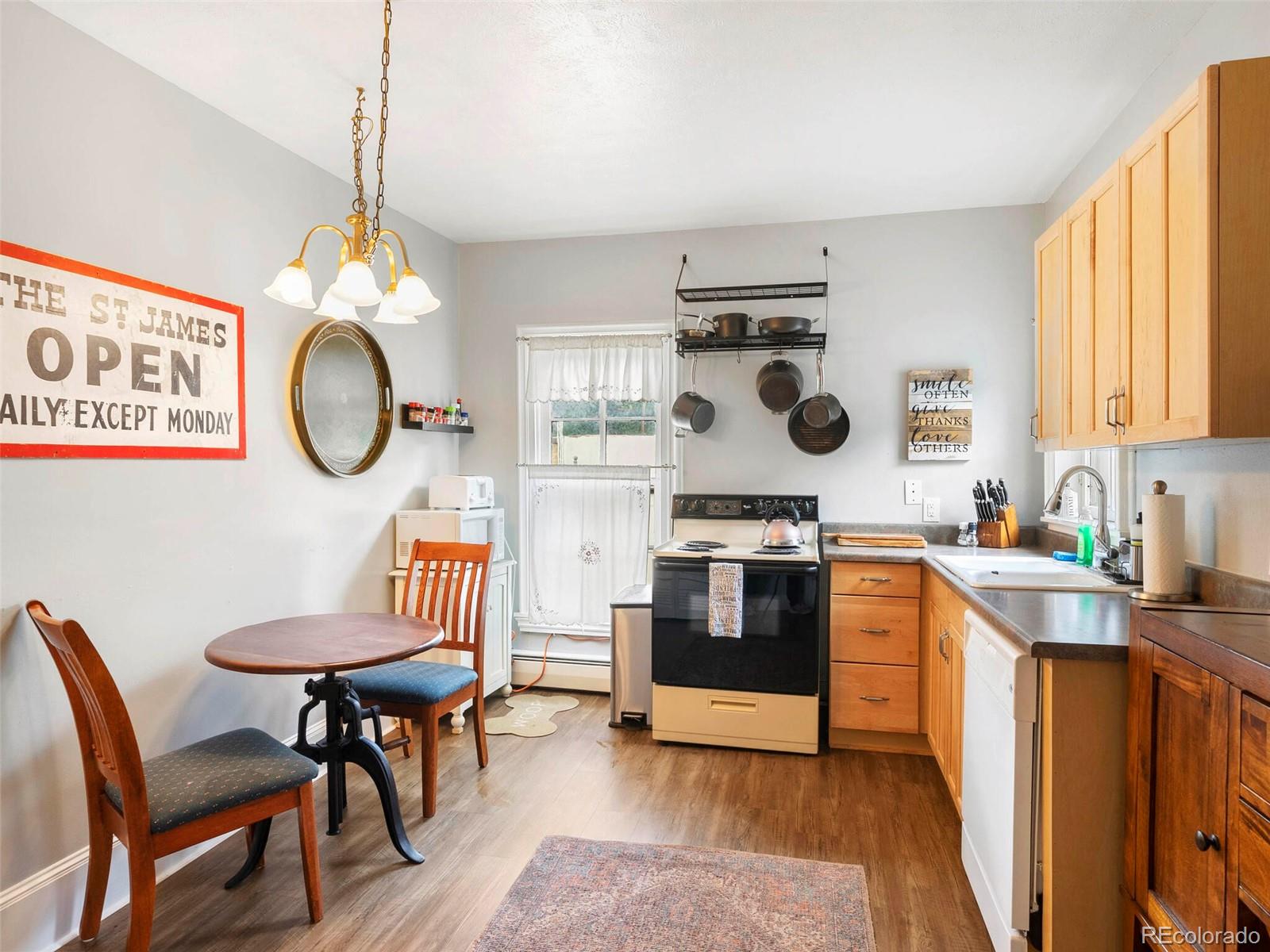 614 Rose Street Georgetown, CO 80444 - Photo 18 of 40 a kitchen with a dining table and chairs