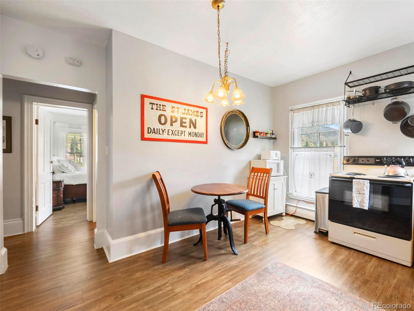 614 Rose Street Georgetown, CO 80444 - Photo 21 of 40 a living room with furniture and a clock