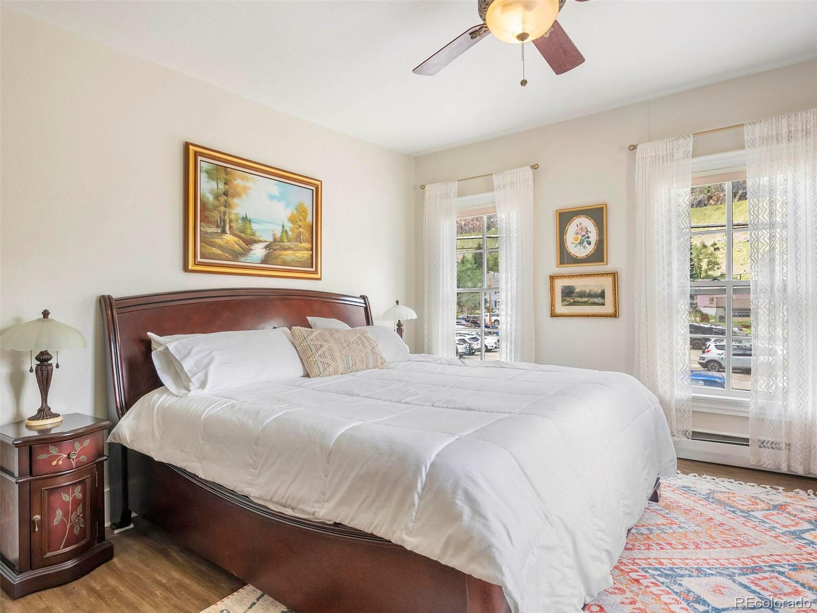 614 Rose Street Georgetown, CO 80444 - Photo 23 of 40 a bedroom with bed and window