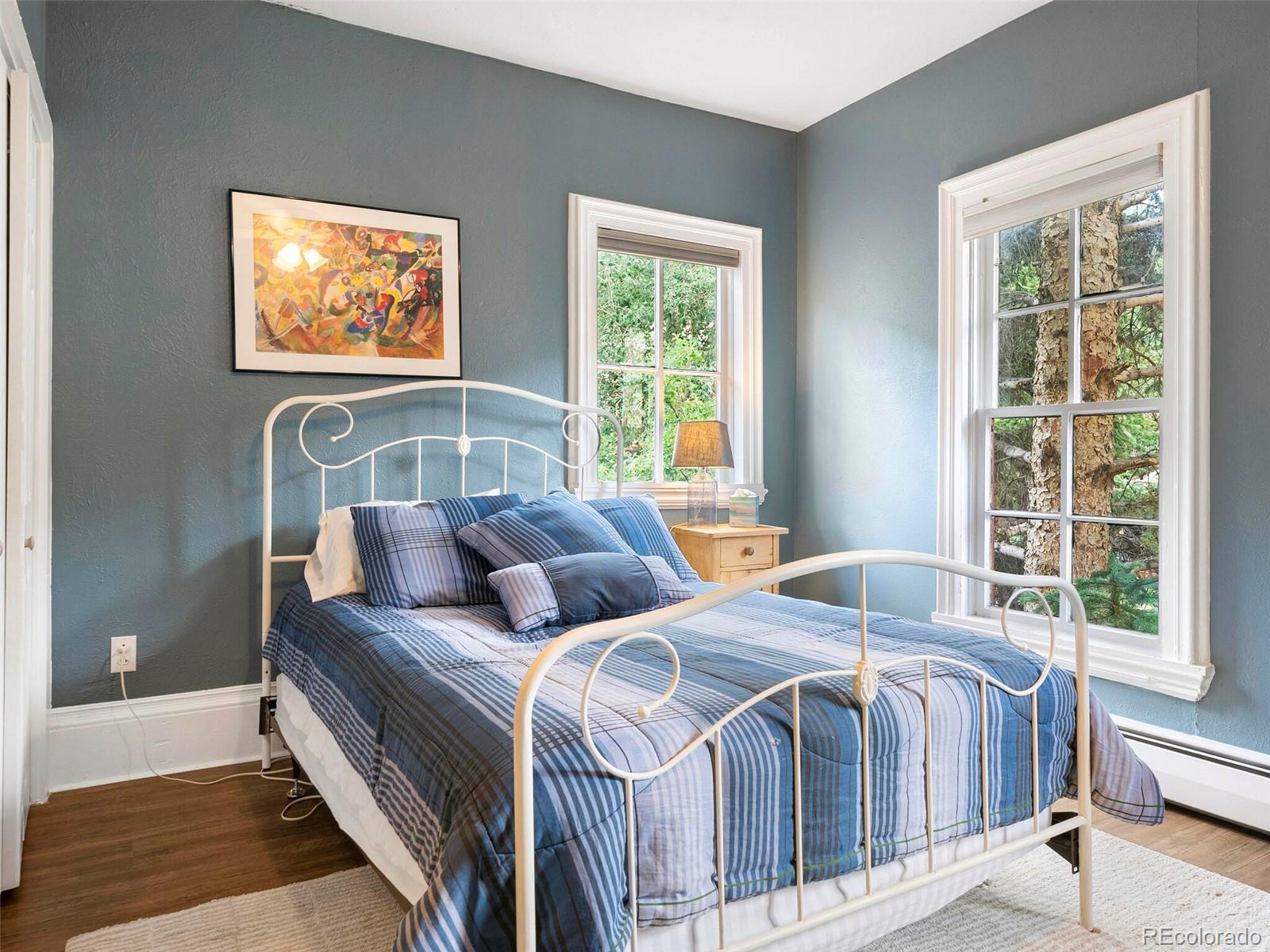 614 Rose Street Georgetown, CO 80444 - Photo 27 of 40 a bedroom with two beds and a window