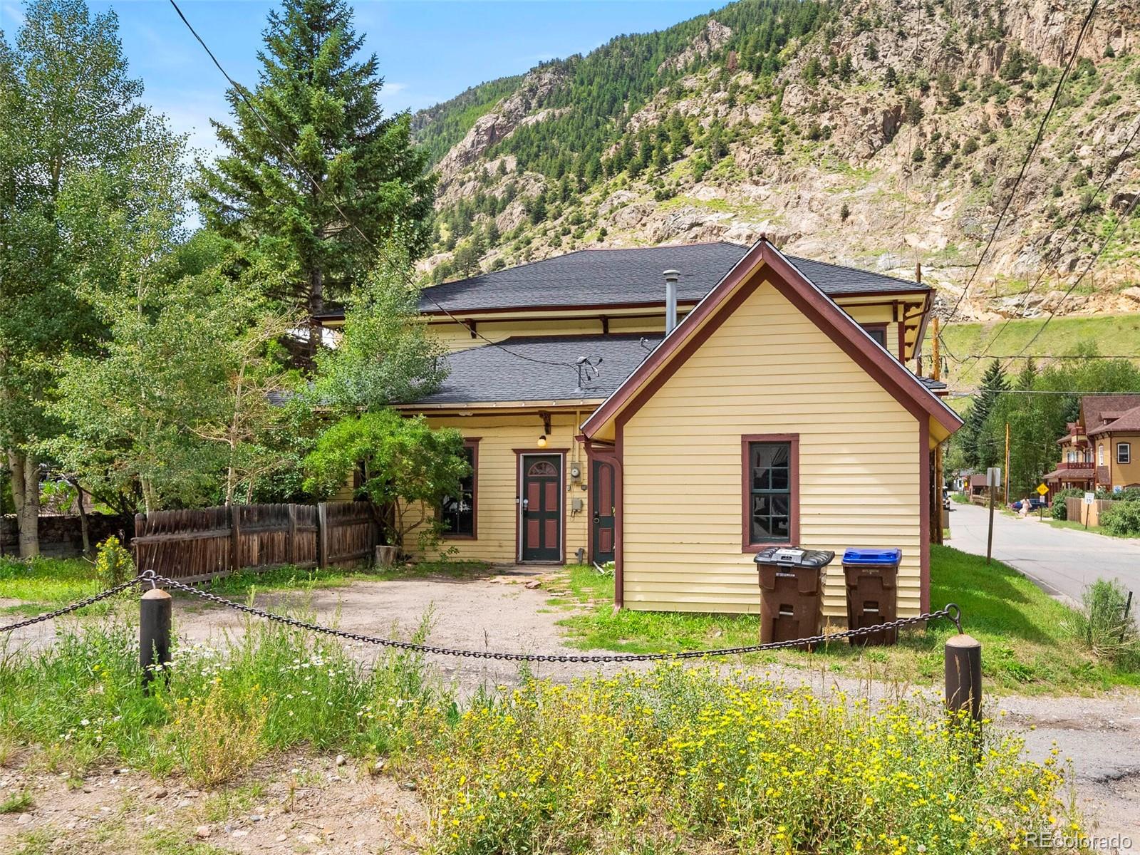 614 Rose Street Georgetown, CO 80444 - Photo 37 of 40 a view of a house with a yard