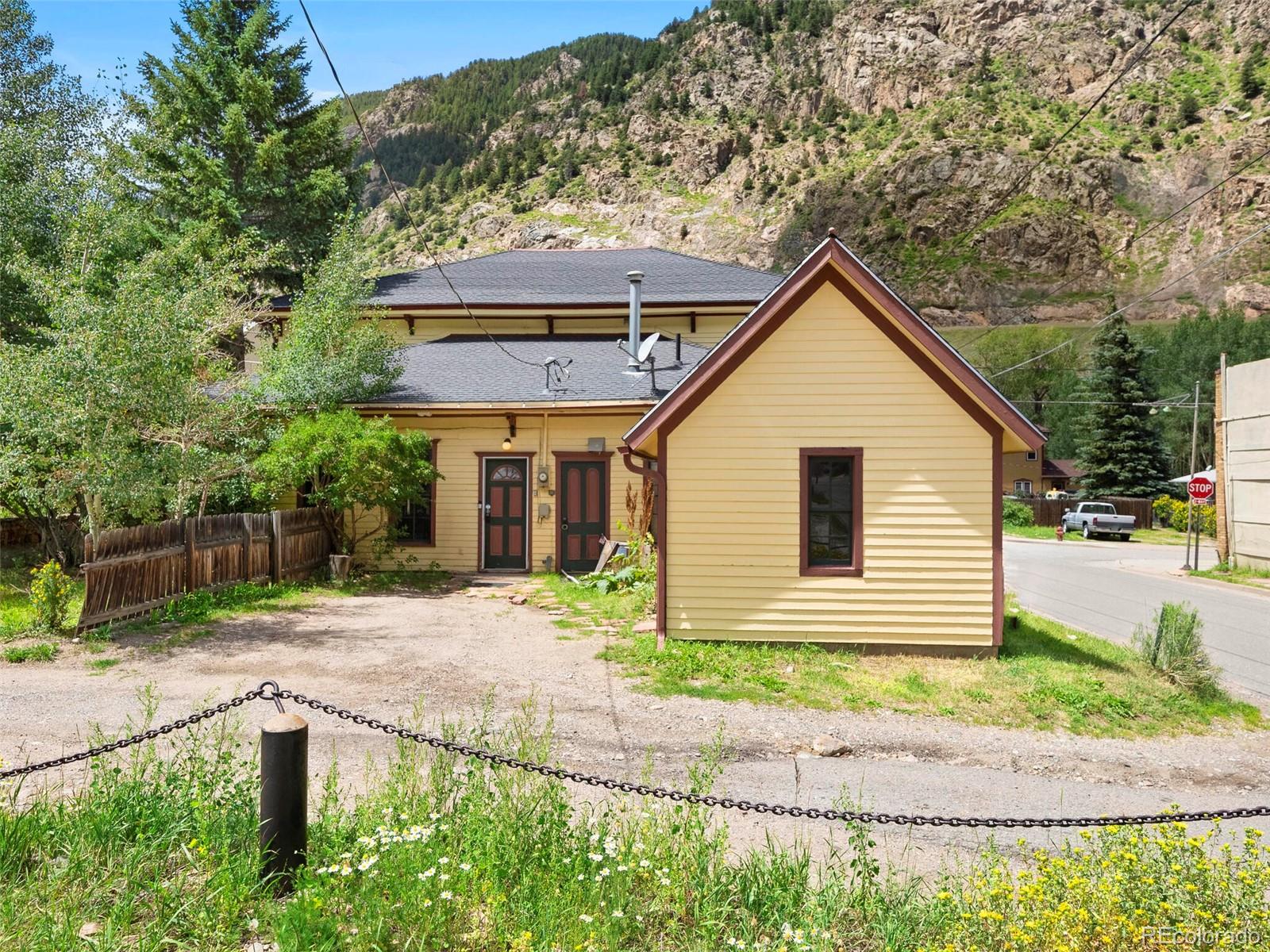 614 Rose Street Georgetown, CO 80444 - Photo 39 of 40 a view of house with backyard space and garden