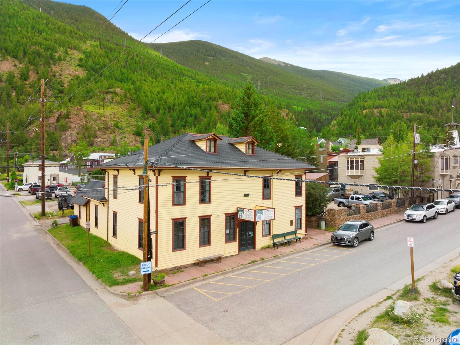 614 Rose Street Georgetown, CO 80444 - Photo 4 of 40 a view of a street with a cars parked
