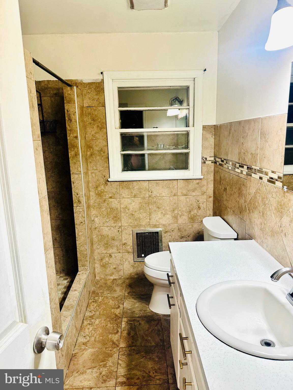 323 Russelcroft Road Winchester, VA 22601 - Photo 28 of 40 a bathroom with a sink and a mirror