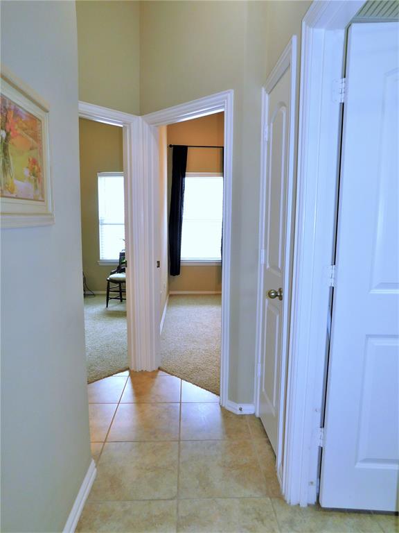 7712 Sweetgate Lane Denton, TX 76208 - Photo 21 of 40 a view of livingroom with a hallway