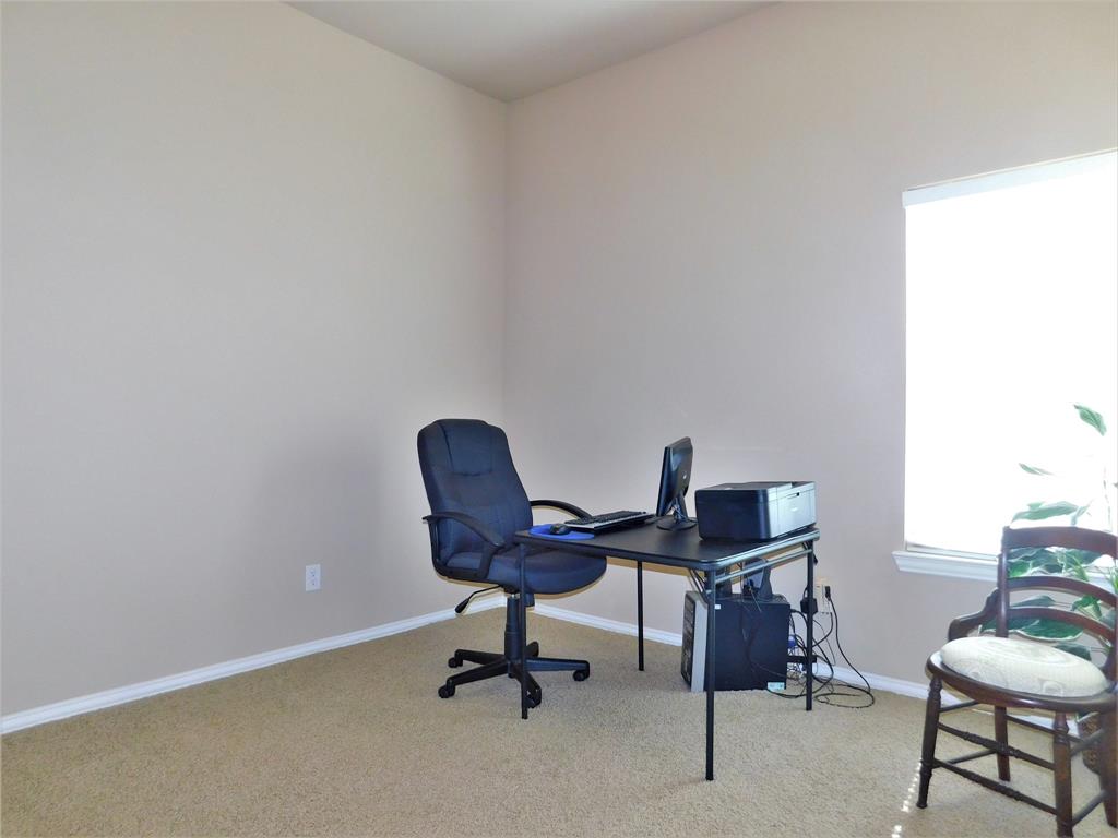 7712 Sweetgate Lane Denton, TX 76208 - Photo 23 of 40 a view of a workspace with furniture
