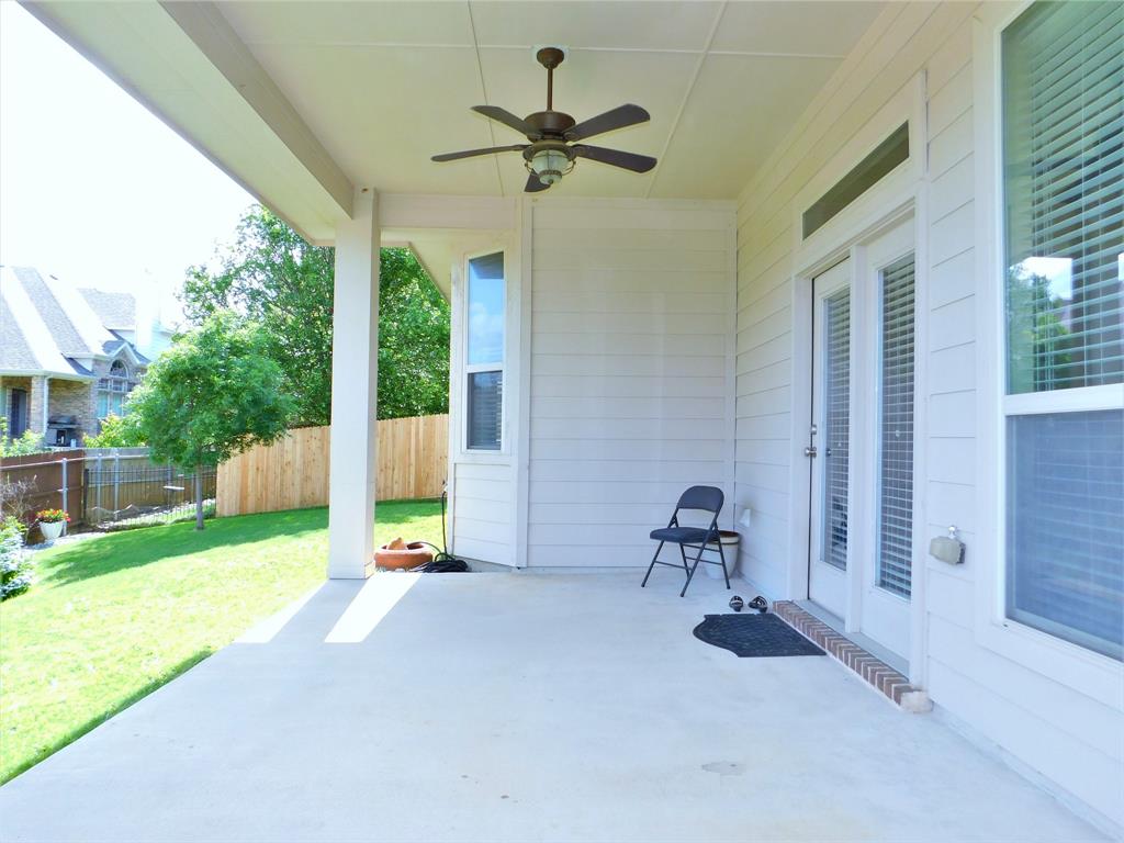 7712 Sweetgate Lane Denton, TX 76208 - Photo 35 of 40 a view of a room with wooden floor and a roof deck