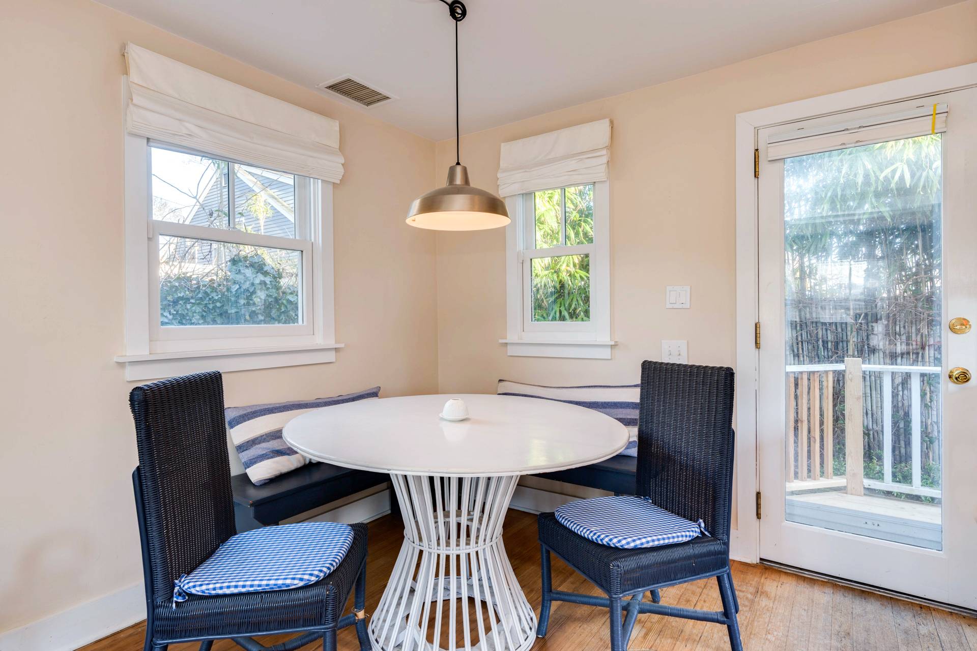 44 Jefferson Street Sag Harbor, NY 11963 - Photo 11 of 18 a view of a dining room with furniture window and wooden floor