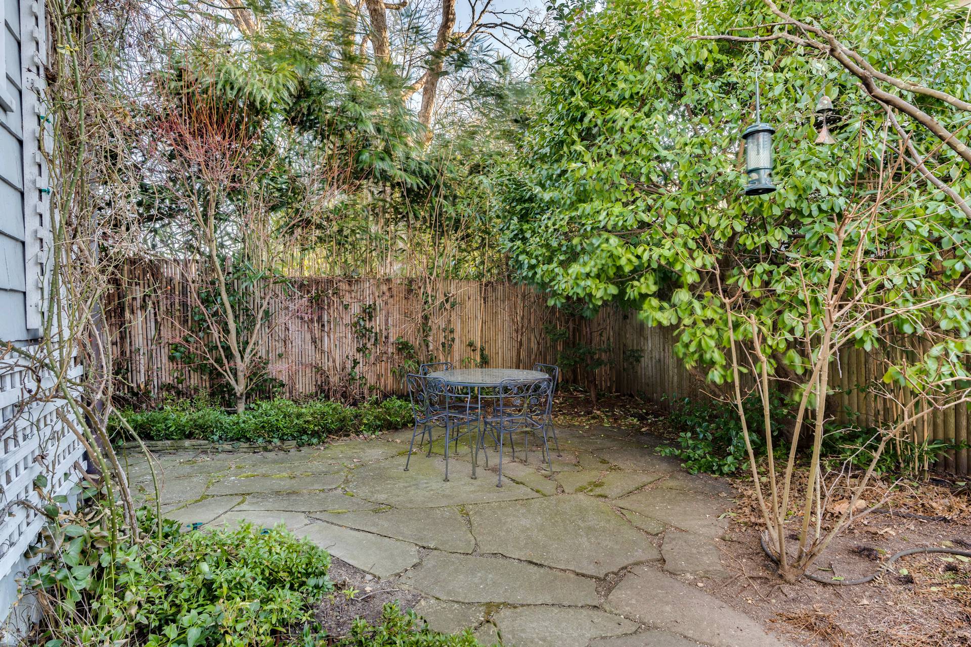 44 Jefferson Street Sag Harbor, NY 11963 - Photo 4 of 18 a view of a backyard with sitting area