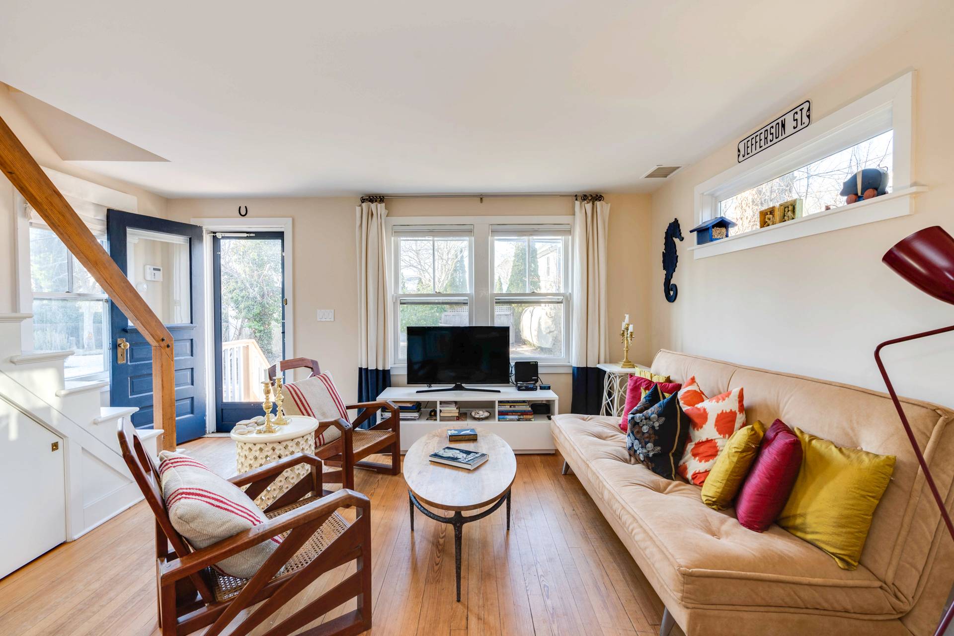 44 Jefferson Street Sag Harbor, NY 11963 - Photo 10 of 18 a living room with furniture and a flat screen tv