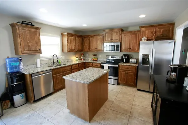 $384,000 | 709 Hollis Avenue, Belton, MO 64012