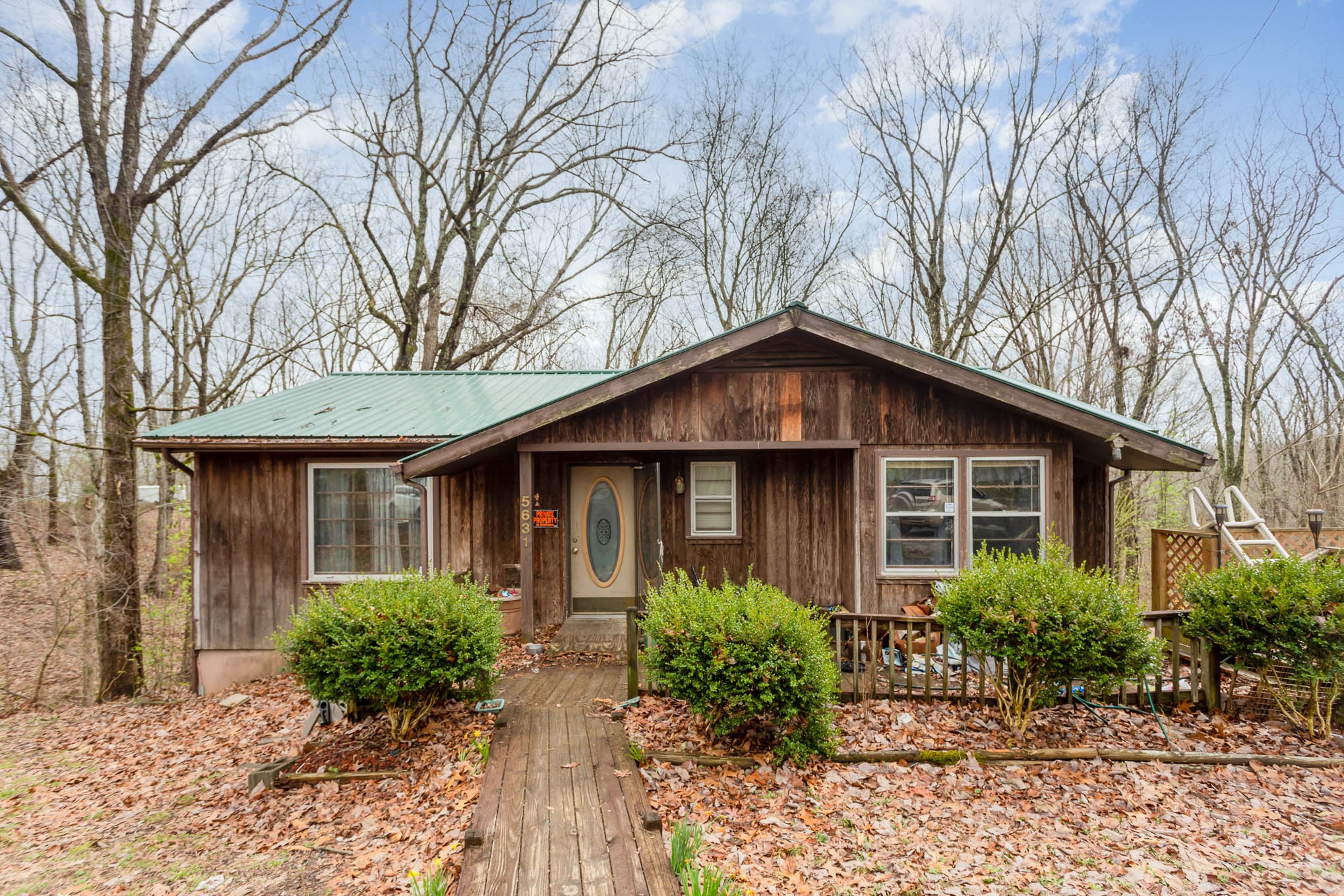 5631 Wesley Ridge Road Lyles, TN 37098 - Photo 1 of 19 a view of a house with a yard