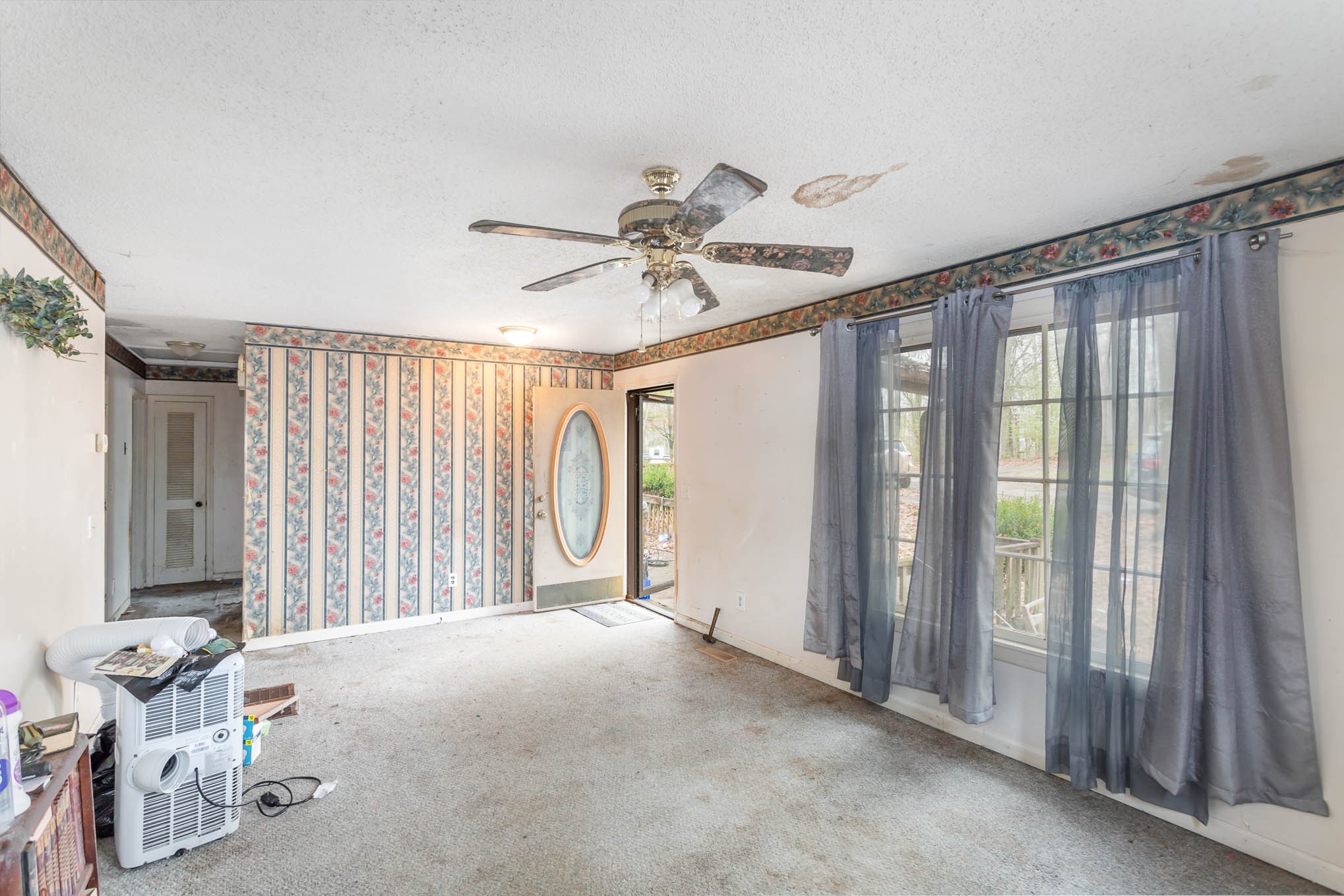 5631 Wesley Ridge Road Lyles, TN 37098 - Photo 3 of 19 a view of a livingroom with a ceiling fan and window