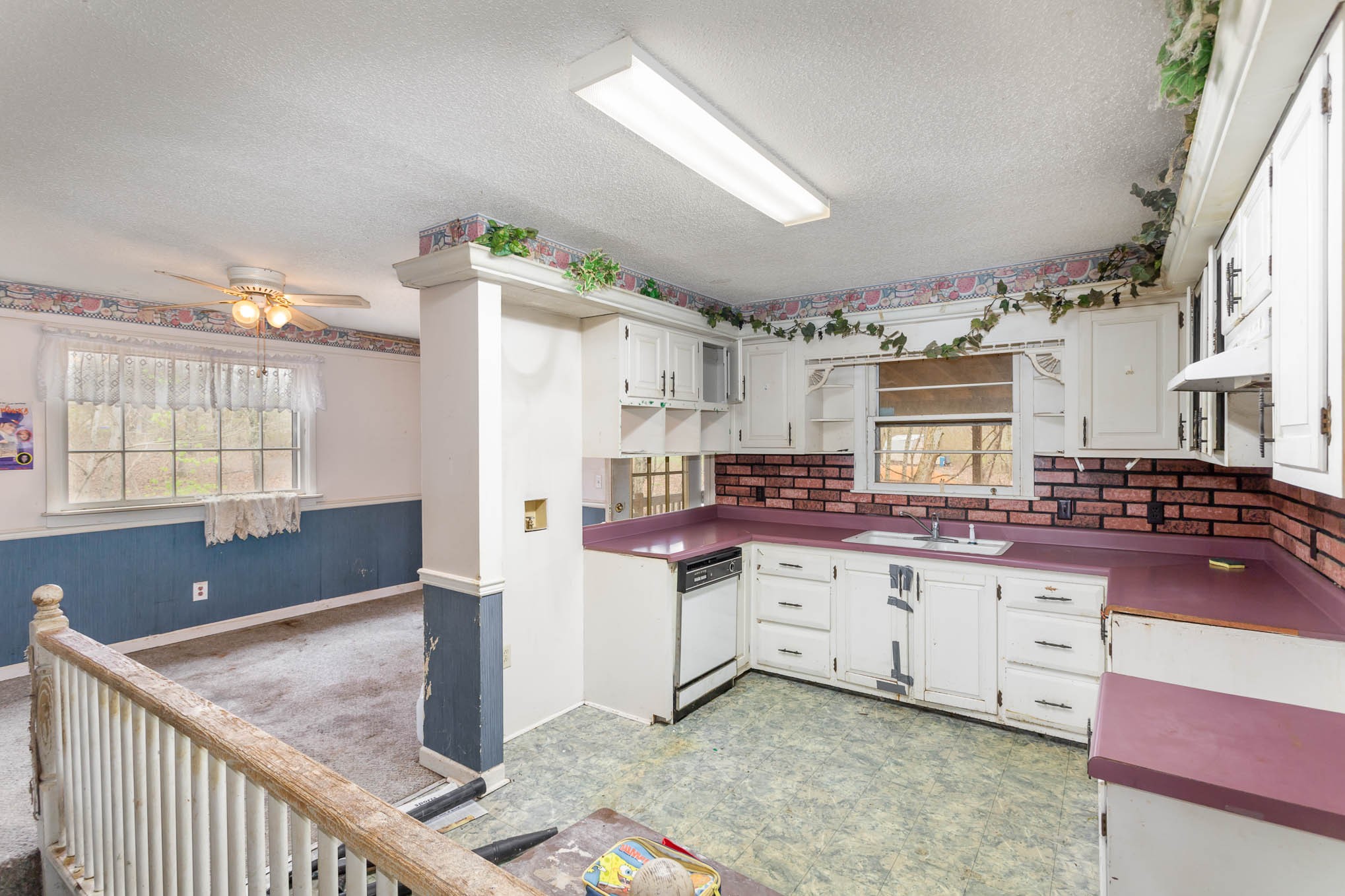5631 Wesley Ridge Road Lyles, TN 37098 - Photo 8 of 19 a kitchen with stainless steel appliances granite countertop a stove a sink and a refrigerator