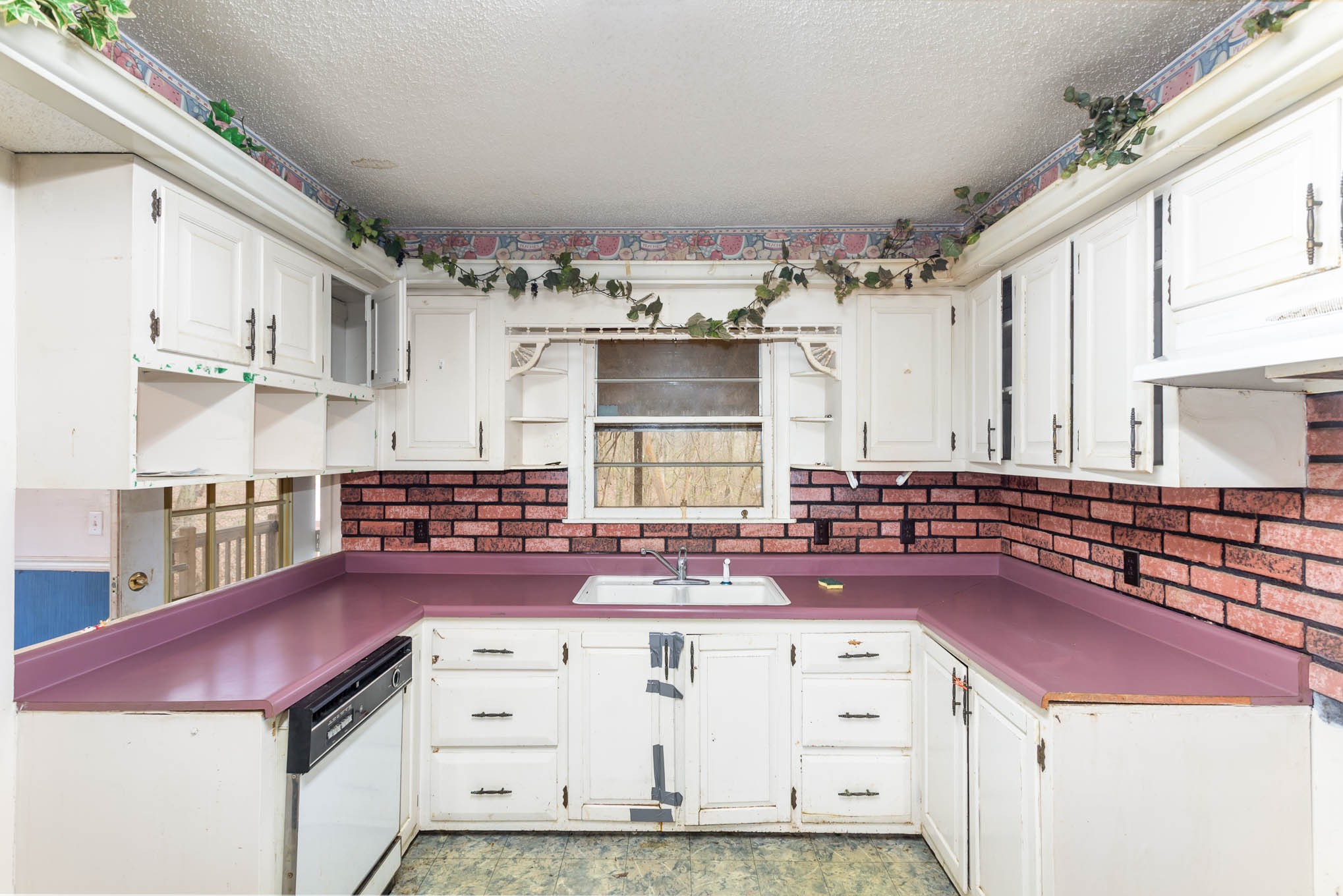 5631 Wesley Ridge Road Lyles, TN 37098 - Photo 10 of 19 a kitchen with cabinets and window
