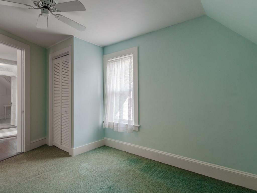 29 Jordan Pond Road Seal Harbor, ME 04675 - Photo 14 of 25 The rear bedroom has a ceiling fan