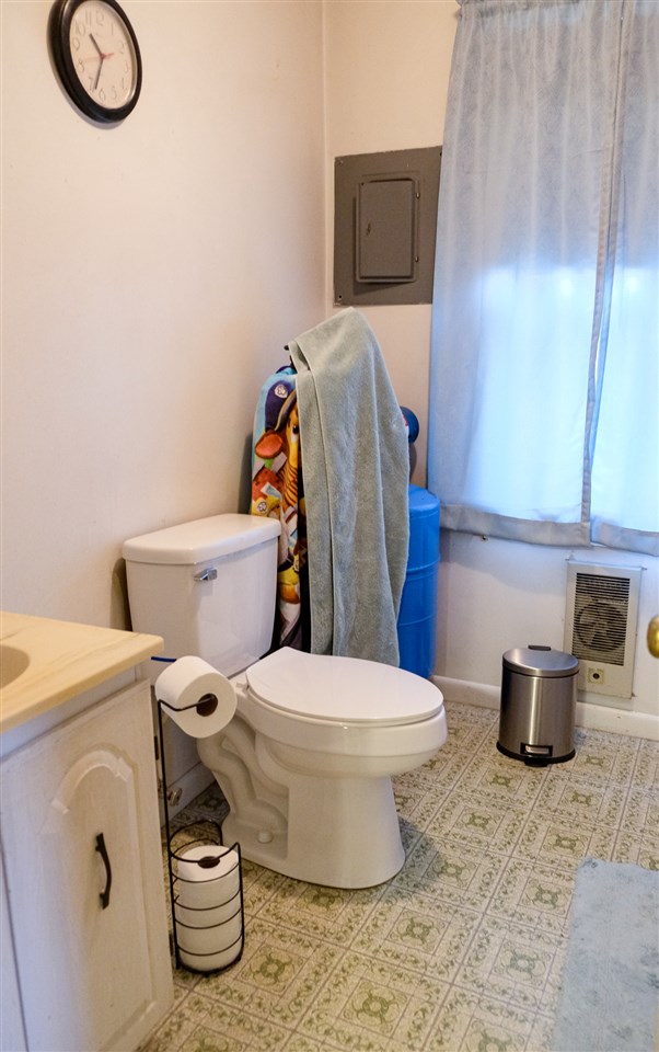 541 Buttermilk Spring Road Staunton, VA 24401 - Photo 24 of 38 a white toilet sitting next to a bathroom sink