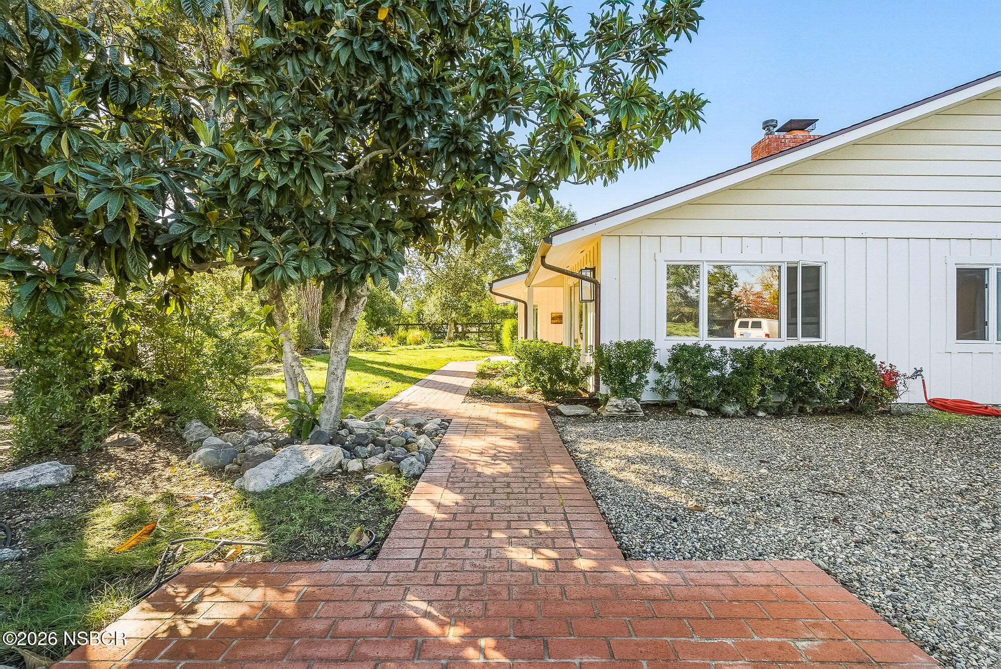 724 North Refugio Road Santa Ynez, CA 93460 - Photo 14 of 47 a view of a house with backyard and garden