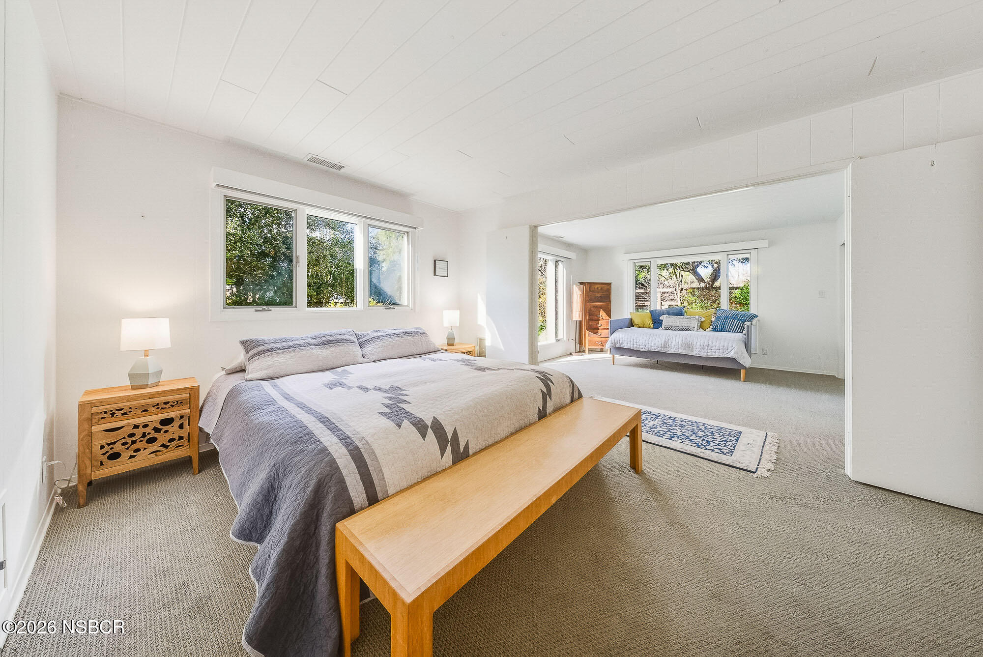 724 North Refugio Road Santa Ynez, CA 93460 - Photo 26 of 47 a bedroom with a bed and a couch