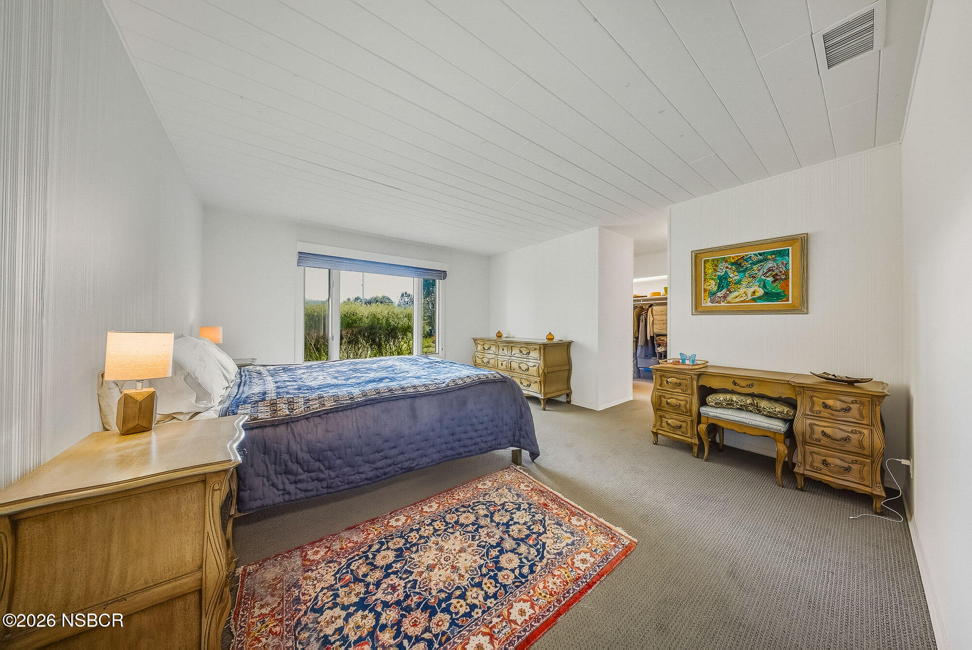 724 North Refugio Road Santa Ynez, CA 93460 - Photo 31 of 47 a bedroom with a bed and a couch