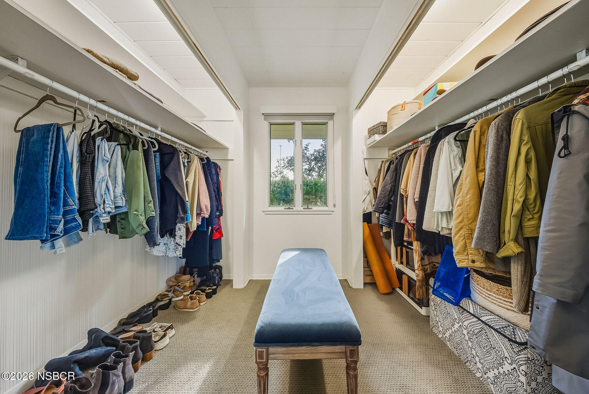 724 North Refugio Road Santa Ynez, CA 93460 - Photo 34 of 47 a view of walk in closet with clothes and shoes