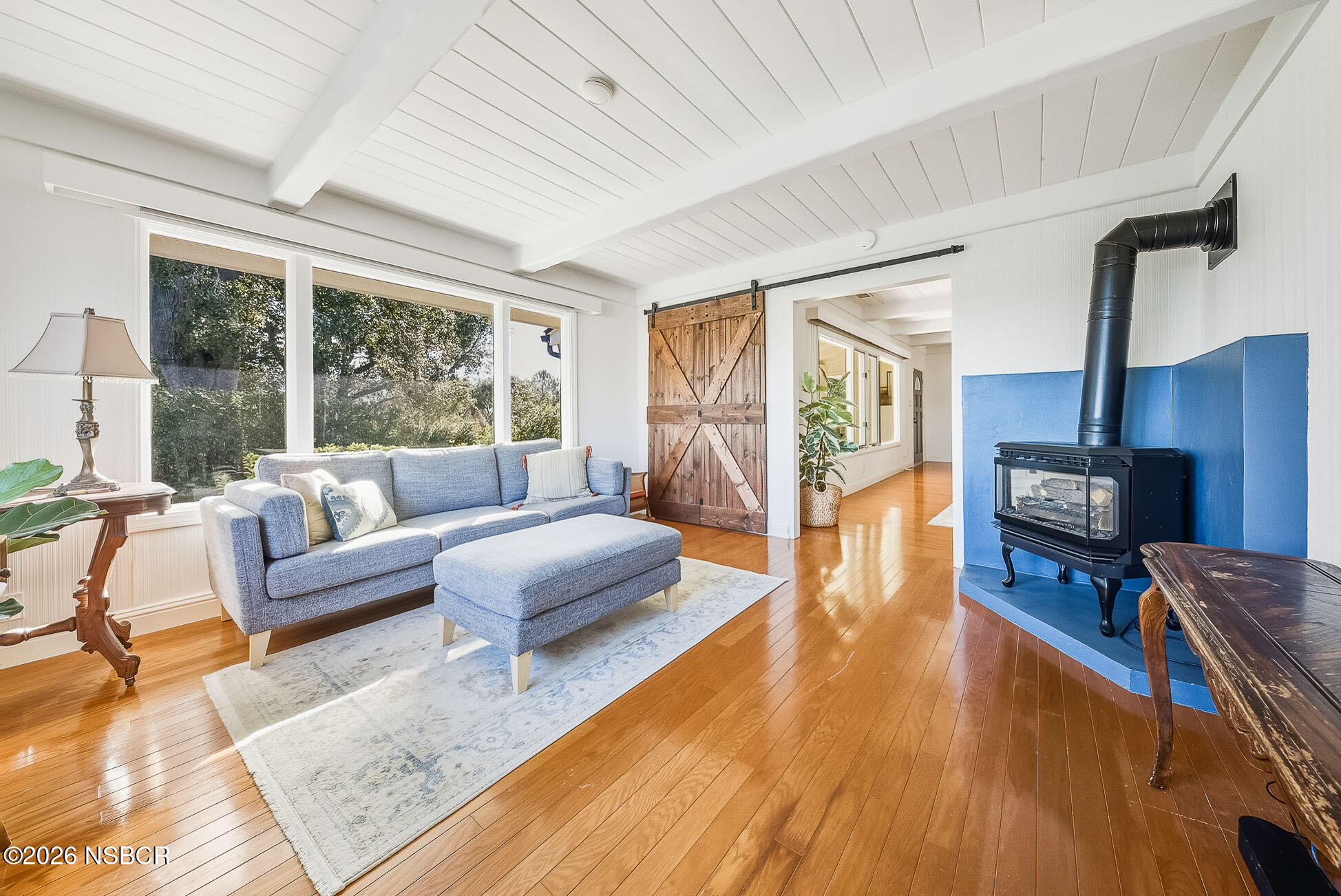 724 North Refugio Road Santa Ynez, CA 93460 - Photo 38 of 47 a living room with furniture and a flat screen tv