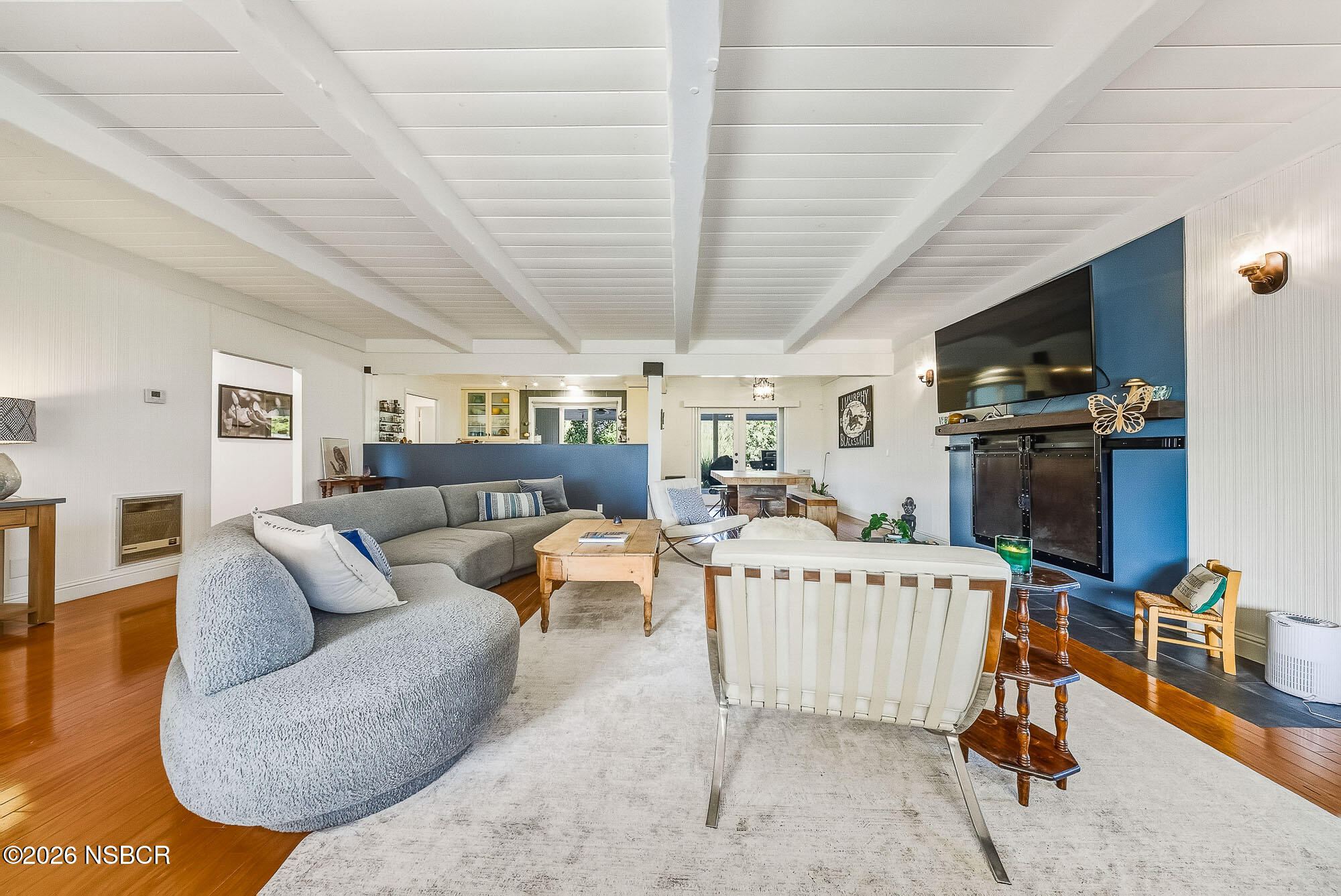 724 North Refugio Road Santa Ynez, CA 93460 - Photo 4 of 47 a living room with furniture and a flat screen tv
