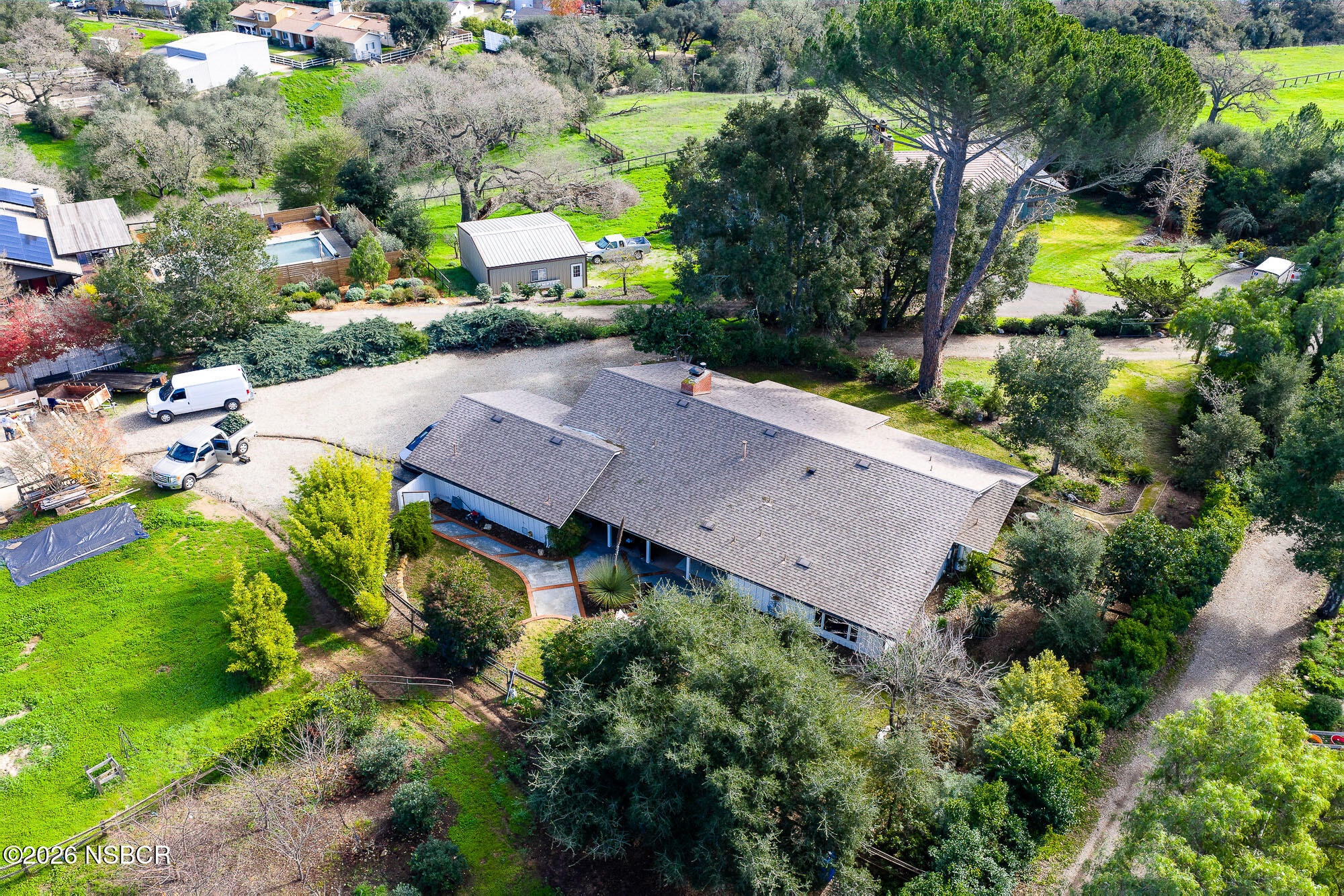 724 North Refugio Road Santa Ynez, CA 93460 - Photo 43 of 47 an aerial view of a house with a yard and swimming pool