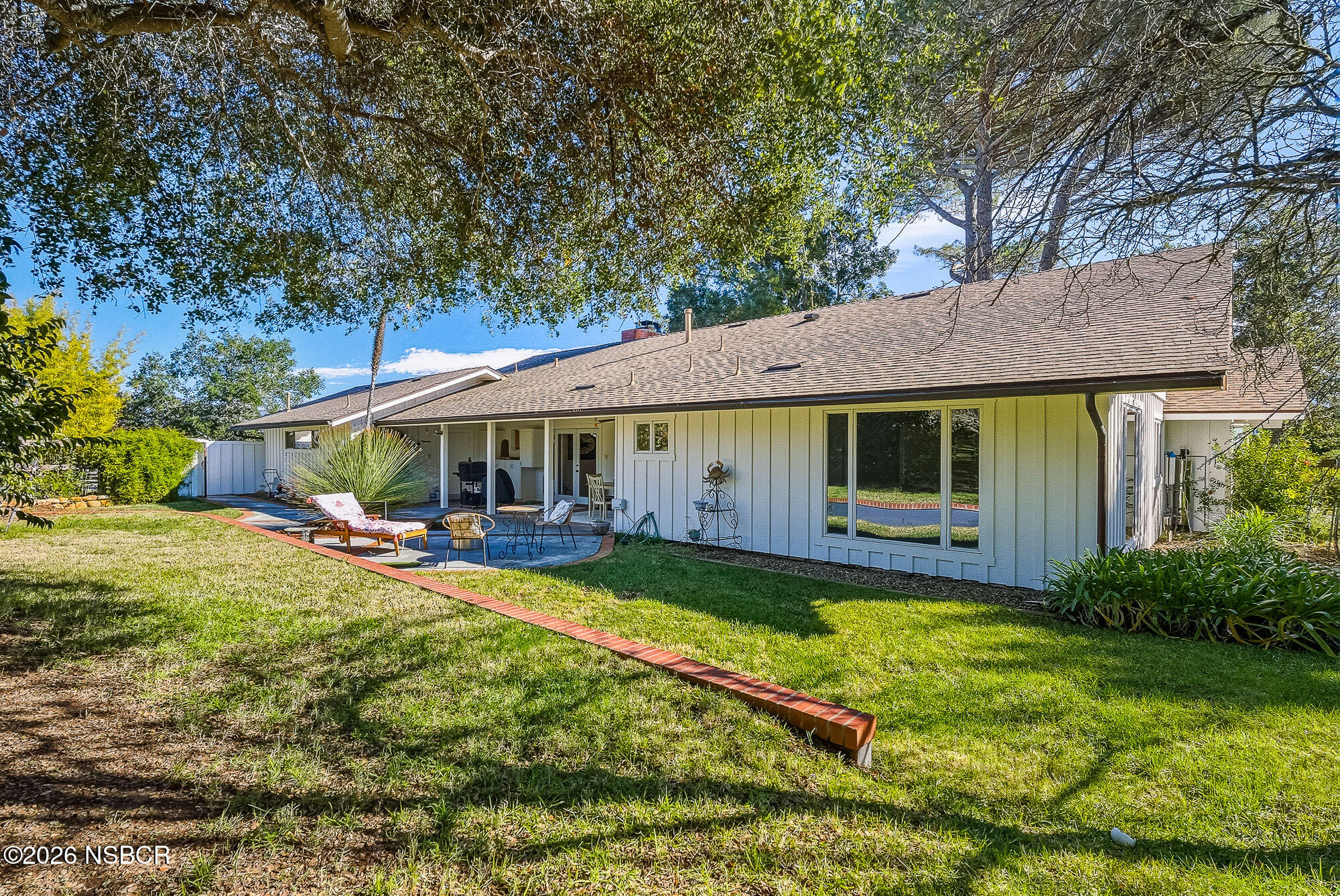 724 North Refugio Road Santa Ynez, CA 93460 - Photo 45 of 47 a view of a house with backyard and sitting area