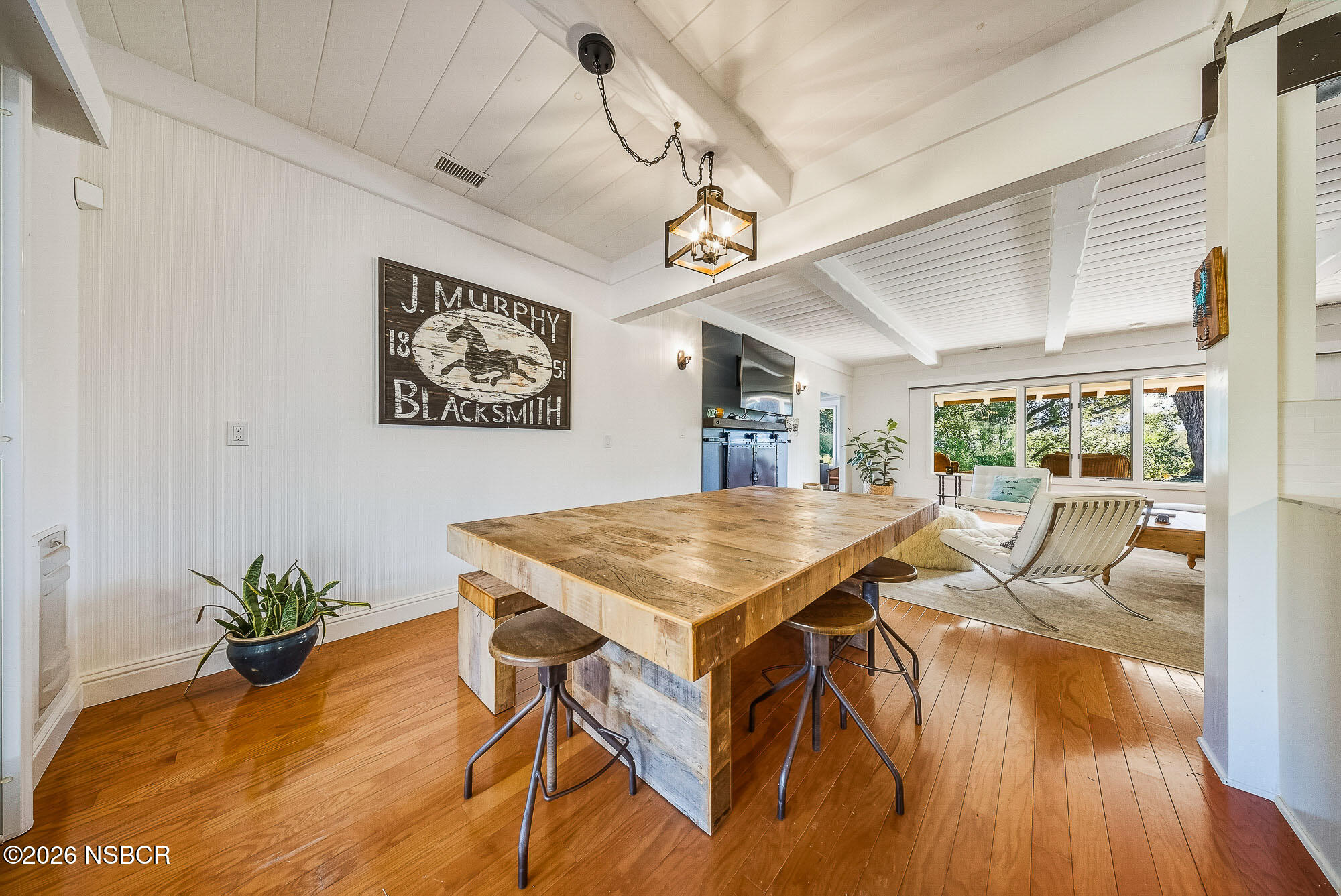 724 North Refugio Road Santa Ynez, CA 93460 - Photo 7 of 47 a view of a dining room with furniture window and wooden floor