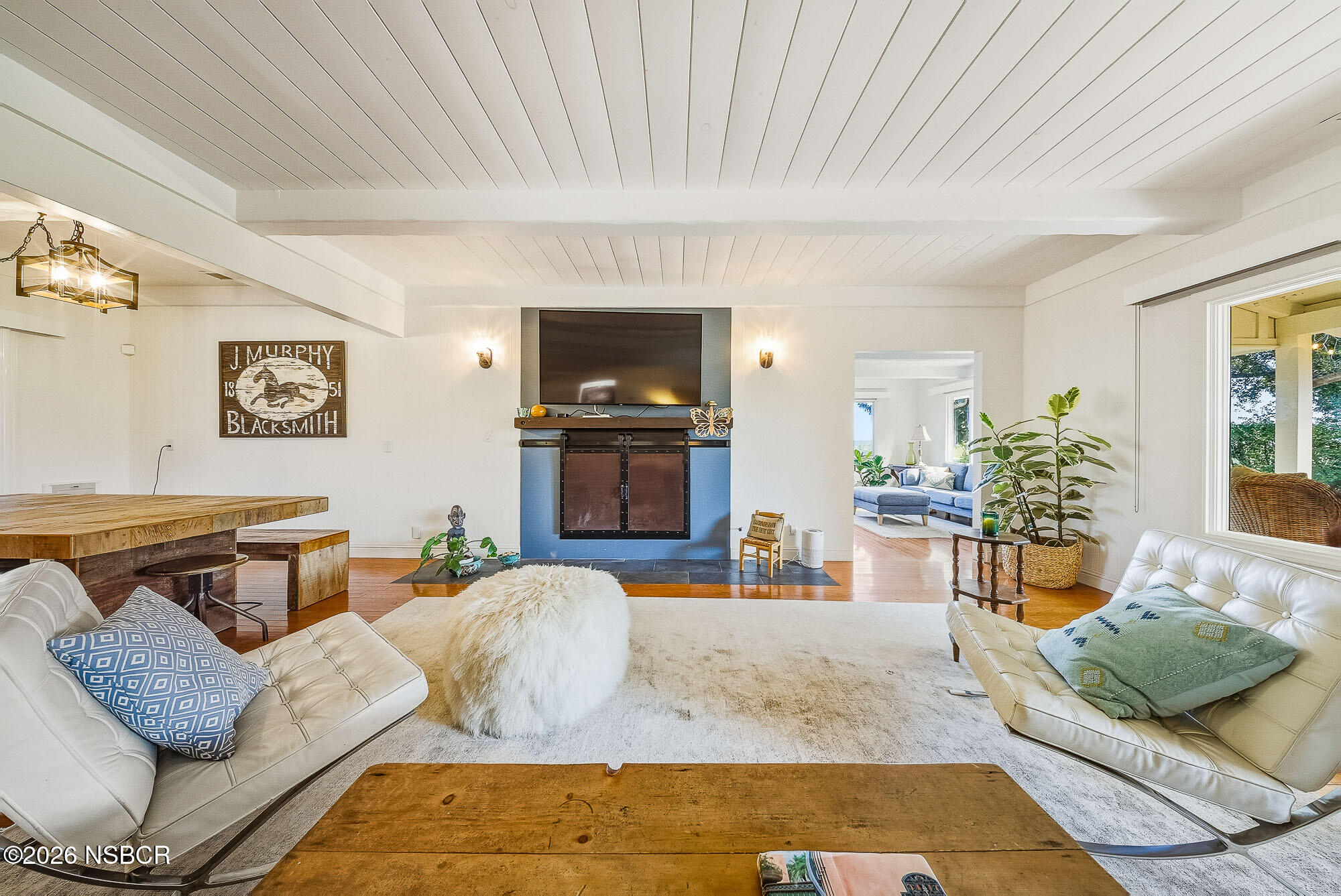 724 North Refugio Road Santa Ynez, CA 93460 - Photo 8 of 47 a living room with furniture and a flat screen tv