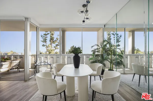 a view of a workspace and dining room