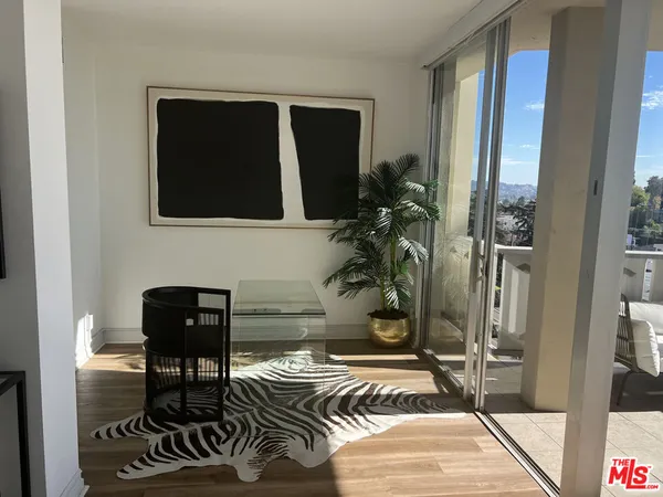 a potted plant sitting on a table and chair
