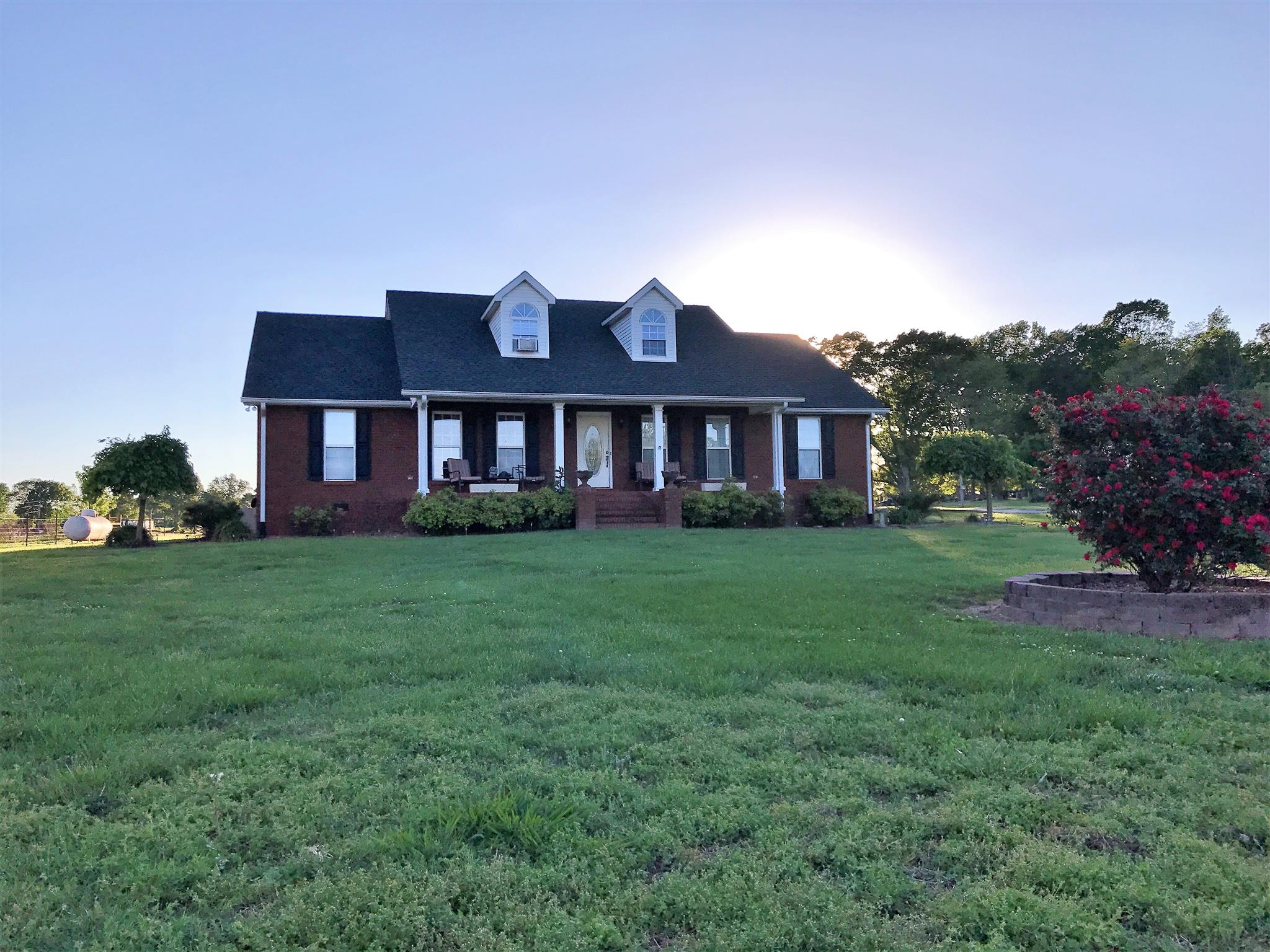 931 Hoodoo Road Beechgrove, TN 37018 - Photo 1 of 28 a front view of a house with a yard
