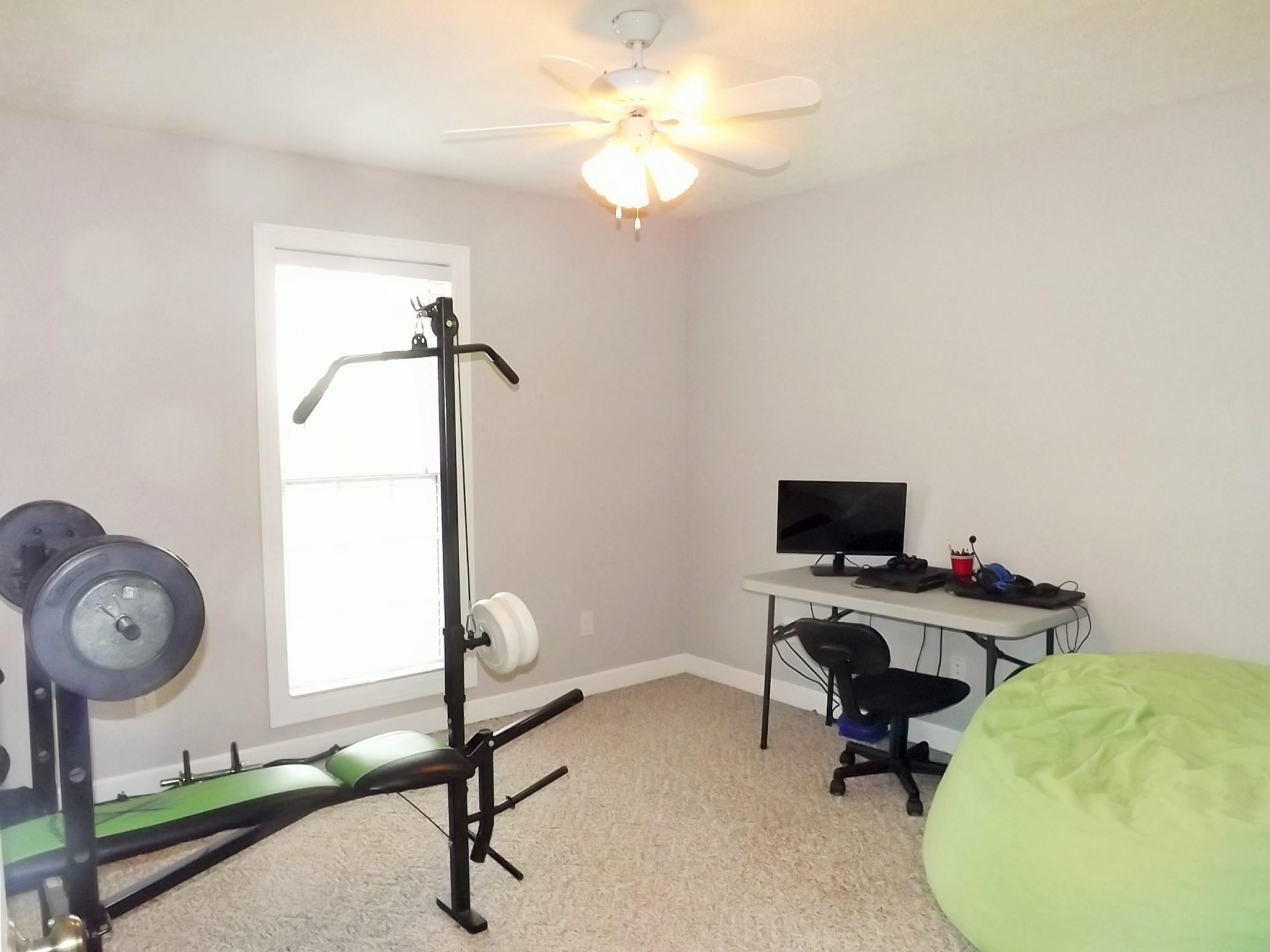 931 Hoodoo Road Beechgrove, TN 37018 - Photo 18 of 28 a view of a workspace with furniture and a window