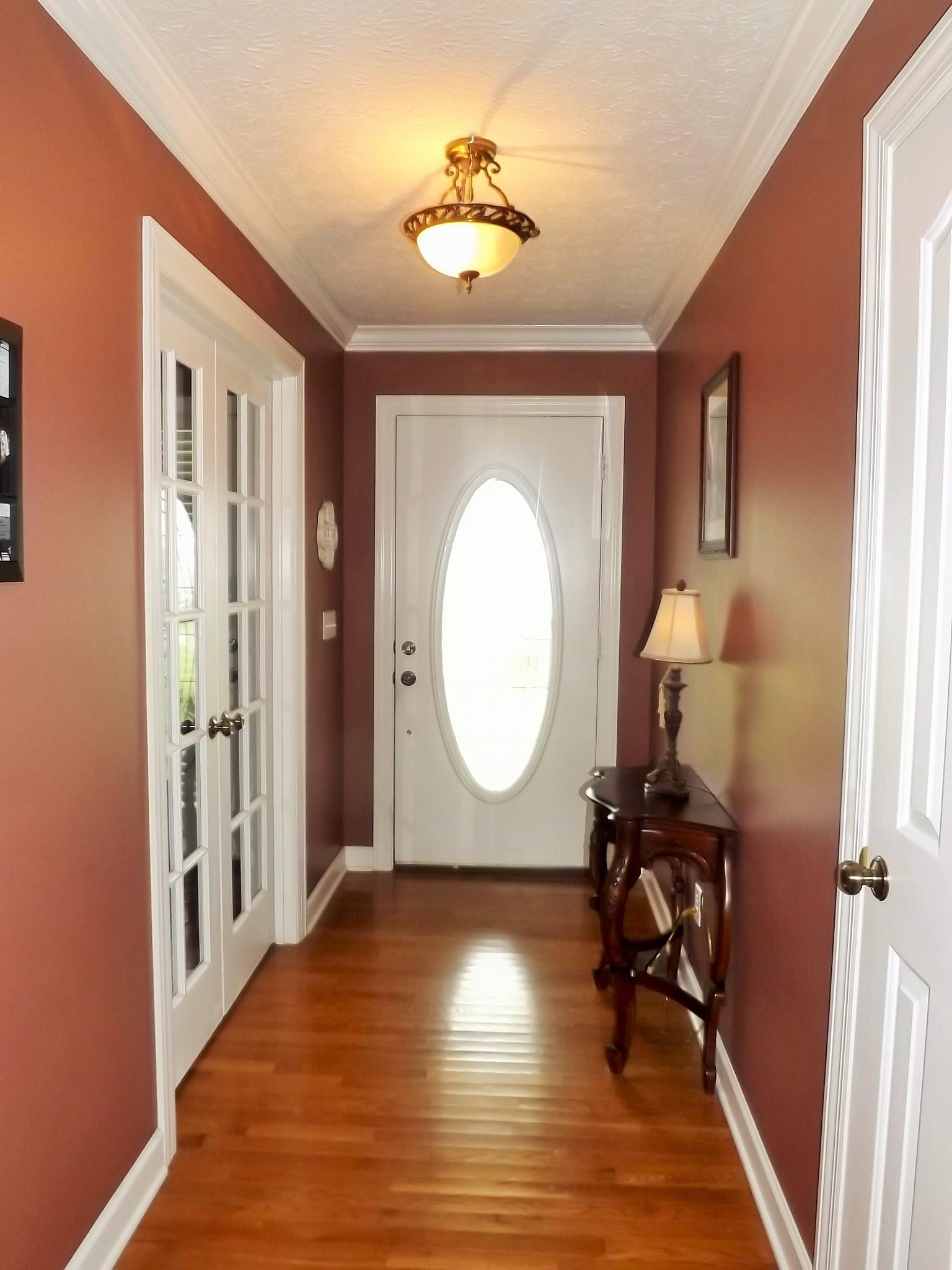 931 Hoodoo Road Beechgrove, TN 37018 - Photo 6 of 28 a view of a room with wooden floor and furniture