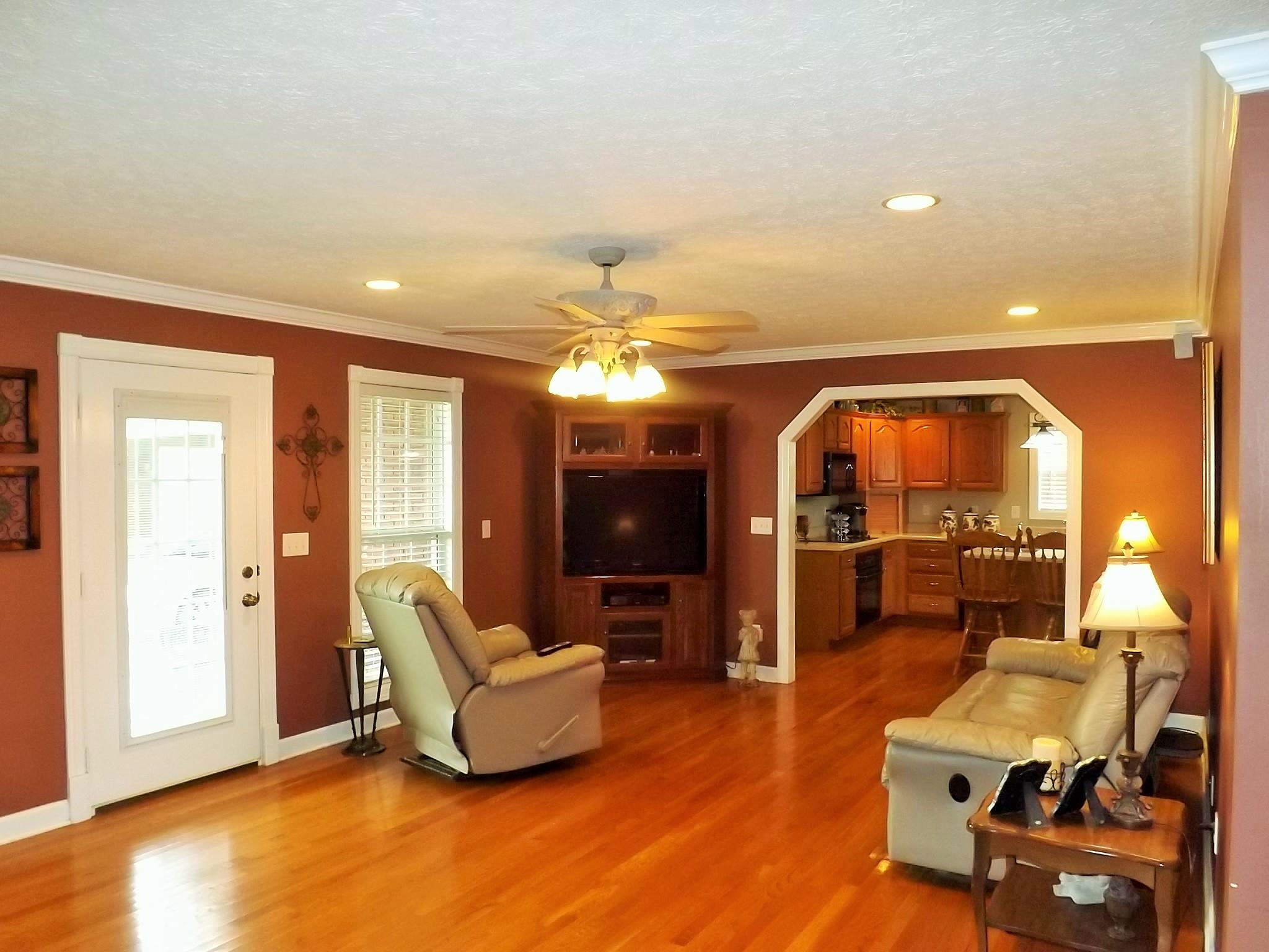 931 Hoodoo Road Beechgrove, TN 37018 - Photo 8 of 28 a living room with furniture and a flat screen tv