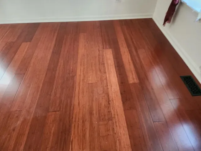 a view of wooden floor in a gallery
