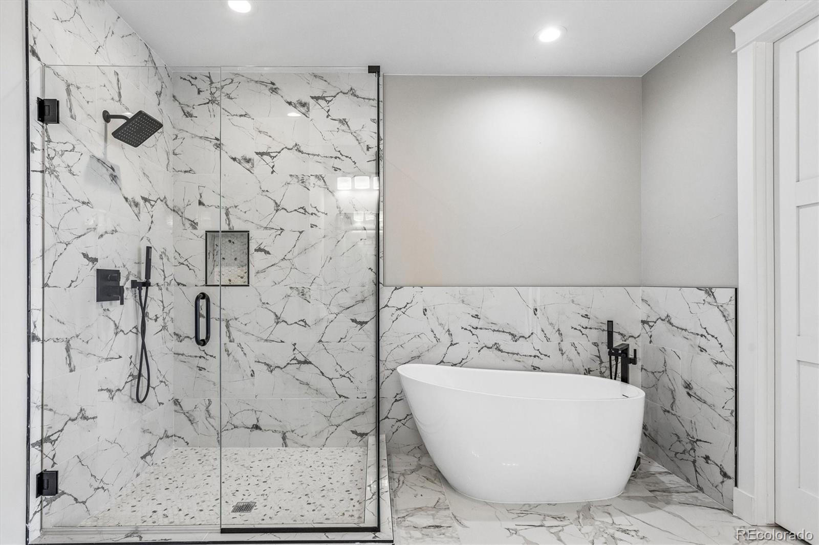 13350 Imboden Road Hudson, CO 80642 - Photo 34 of 50 a bathroom with a bathtub and shower