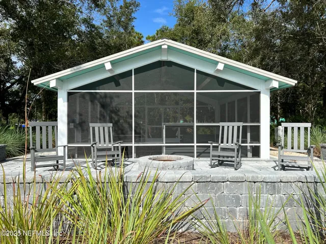 a view of balcony with furniture