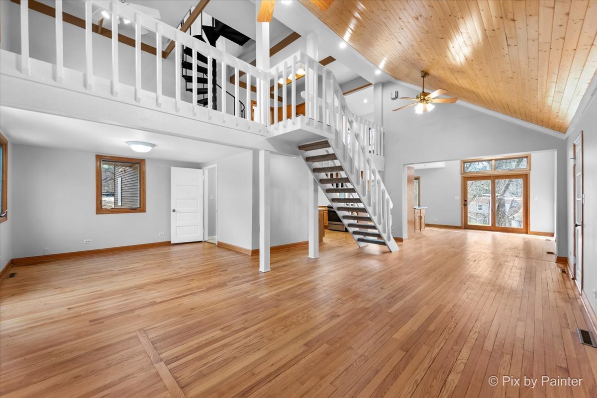7611 Beverly Way Spring Grove, IL 60081 - Photo 14 of 33 a view of an entryway with wooden floor