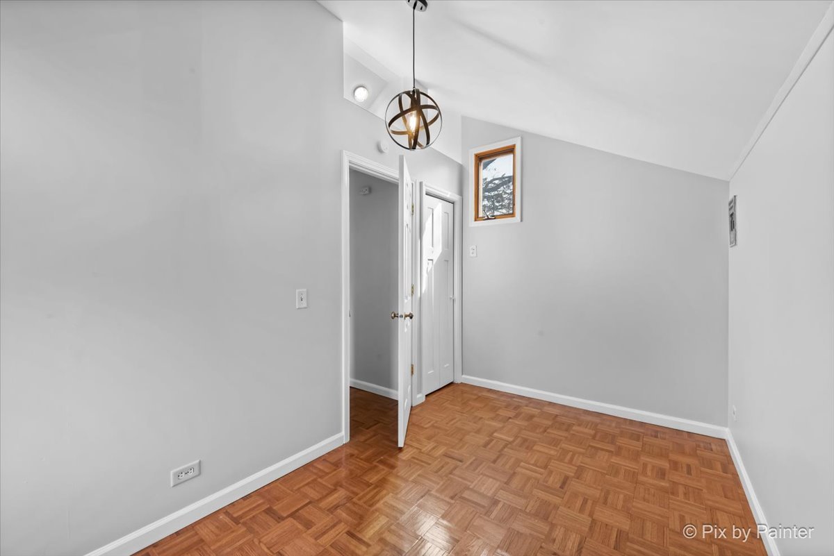 7611 Beverly Way Spring Grove, IL 60081 - Photo 29 of 33 a view of empty room with window and entryway